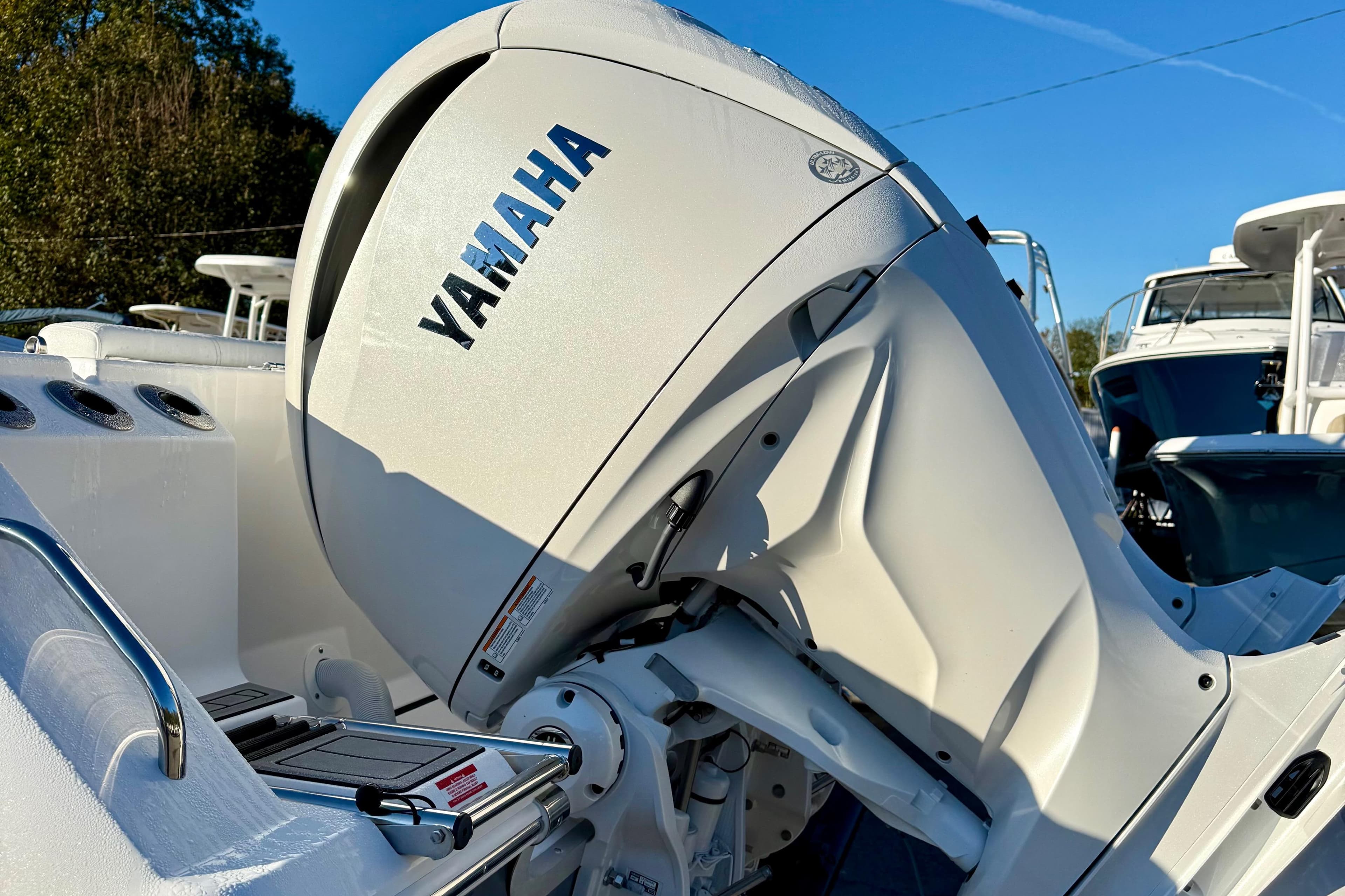 2026 Tidewater 282 CC Adventure boat with Yamaha outboard motor in a marina setting.