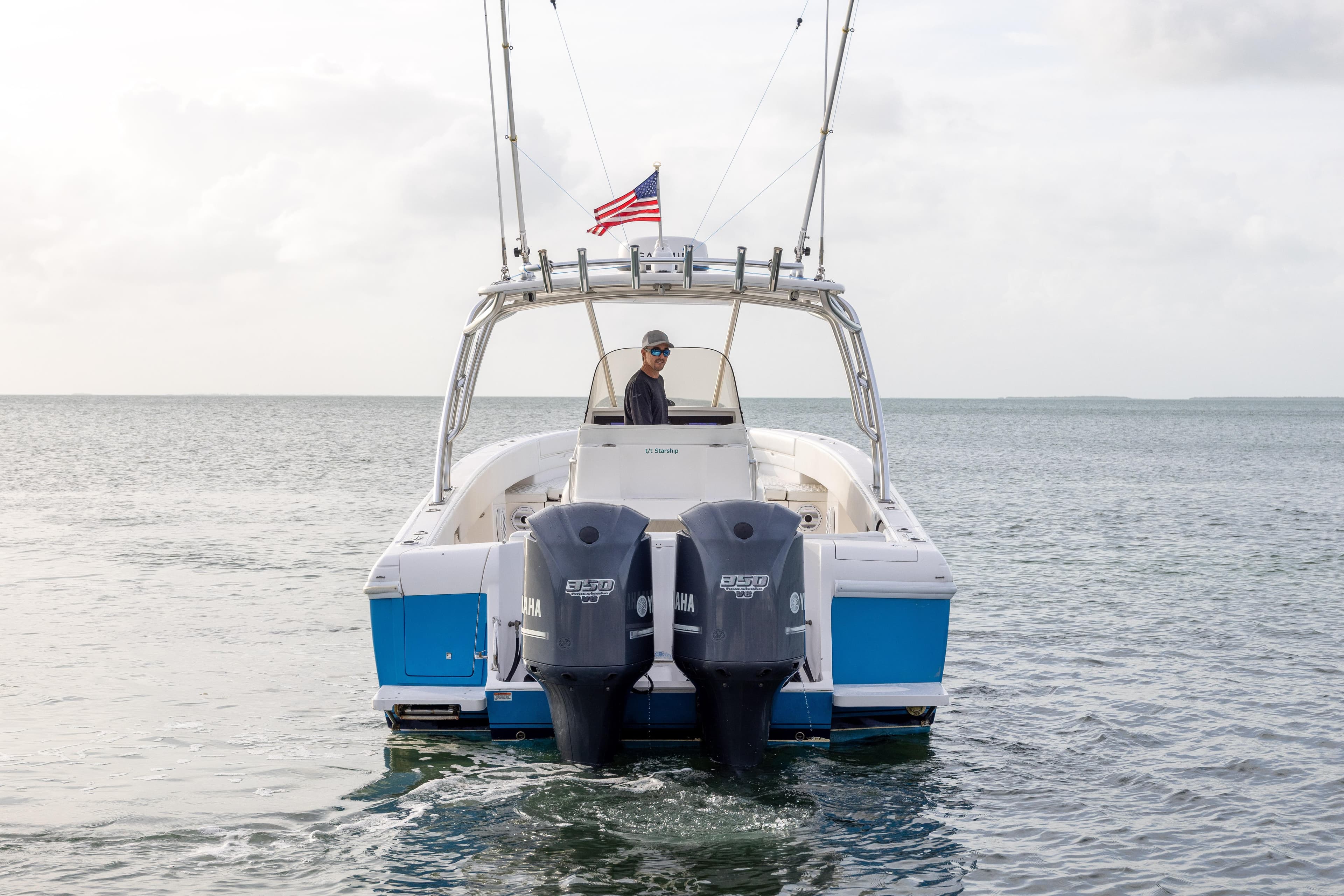2011 Intrepid 370 Center Console boat with dual Yamaha engines on open water.