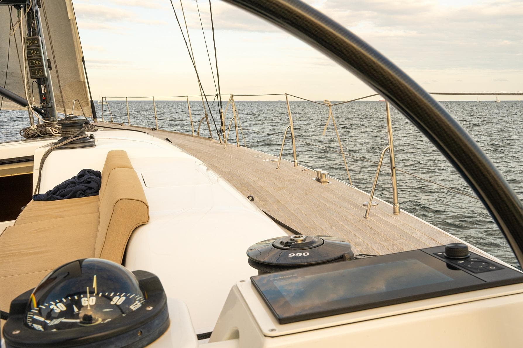 Sailing on a 2010 Nautor Swan 60 yacht, view from the deck at sea.