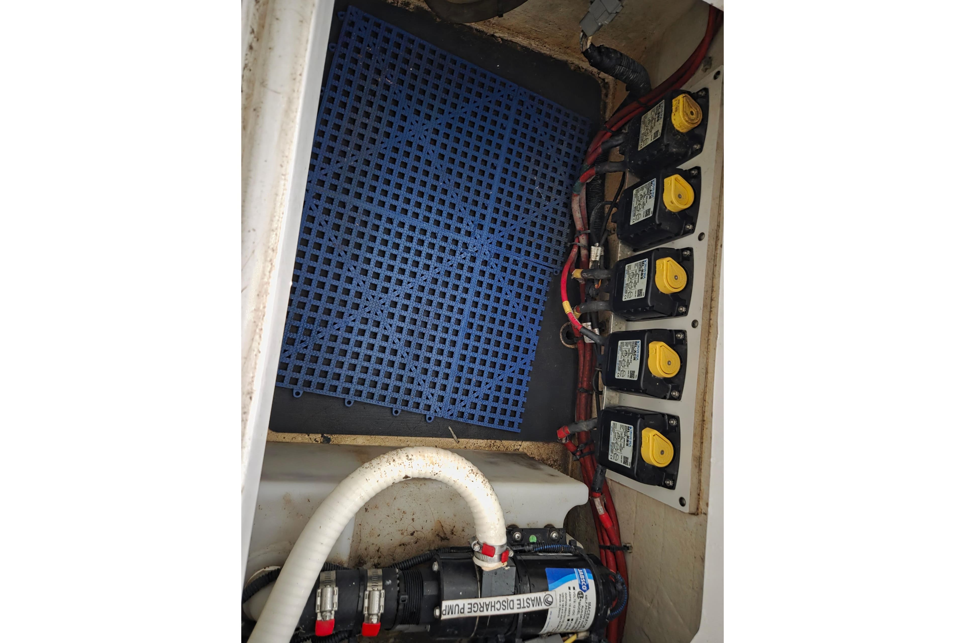 Electrical panel and wiring inside a 2019 Edgewater 262CX Crossover boat.
