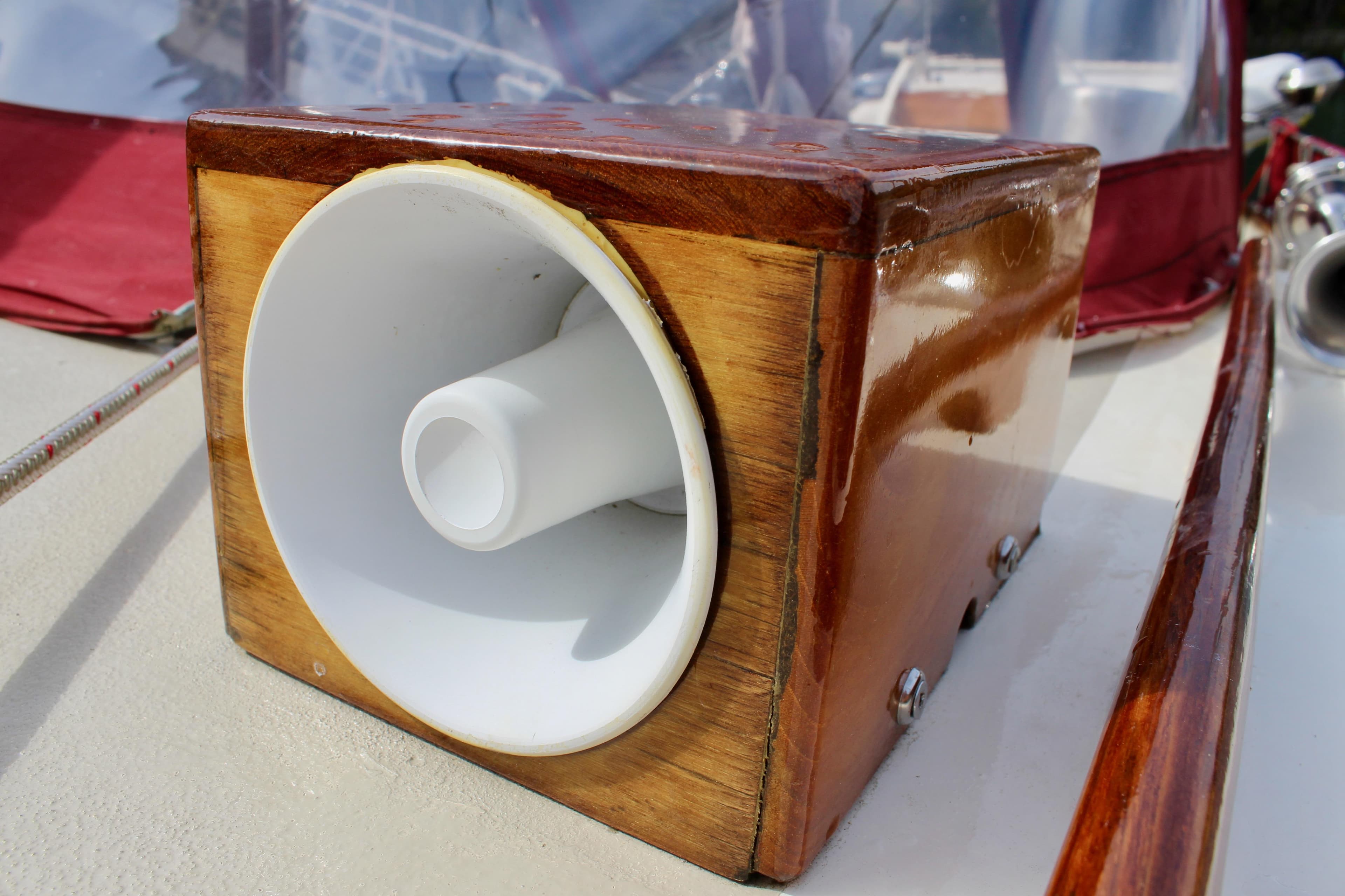 Wooden speaker box on 1981 Skookum 53 boat deck.