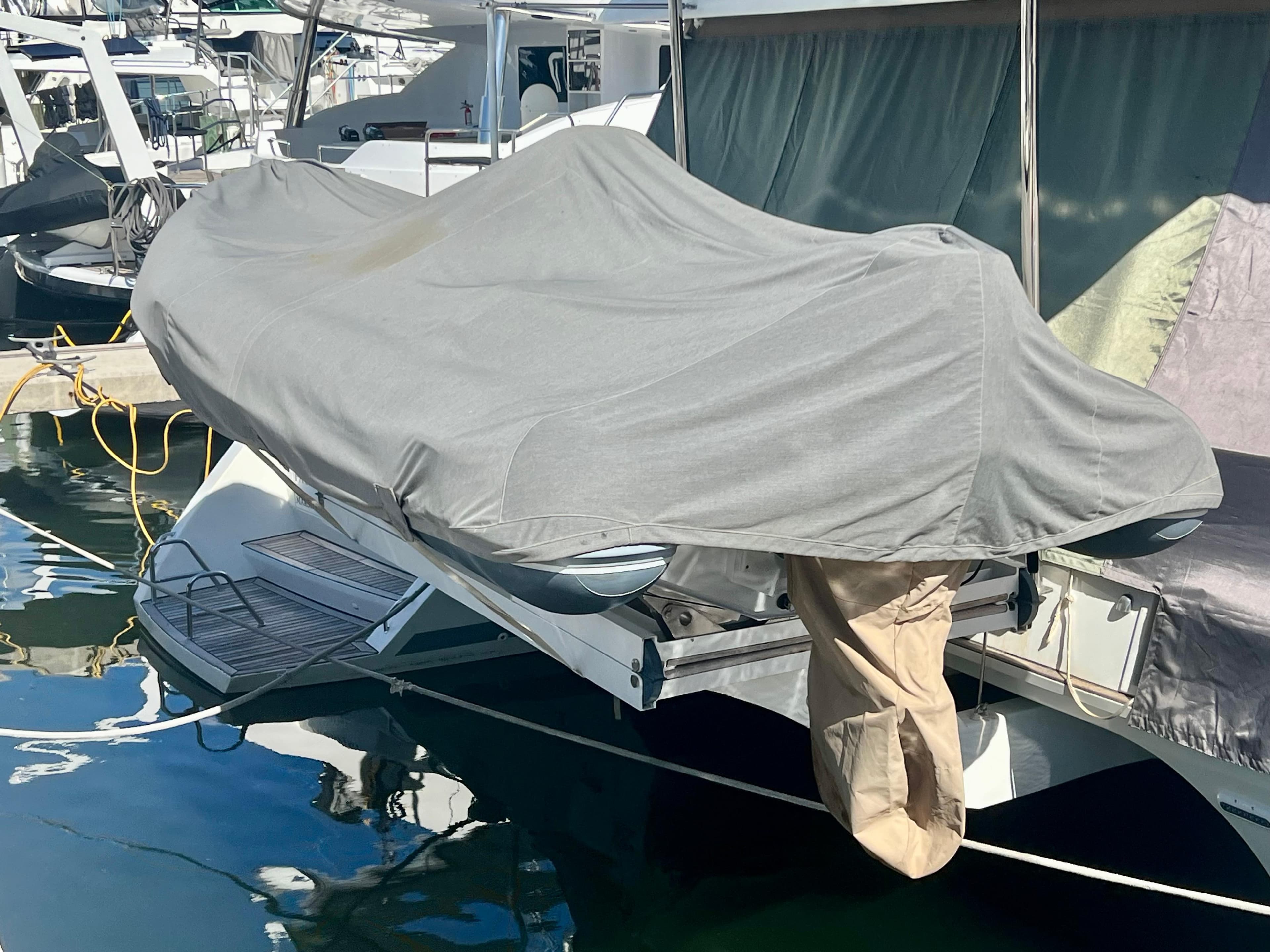Covered Lagoon 620 catamaran docked at marina, 2017 model.