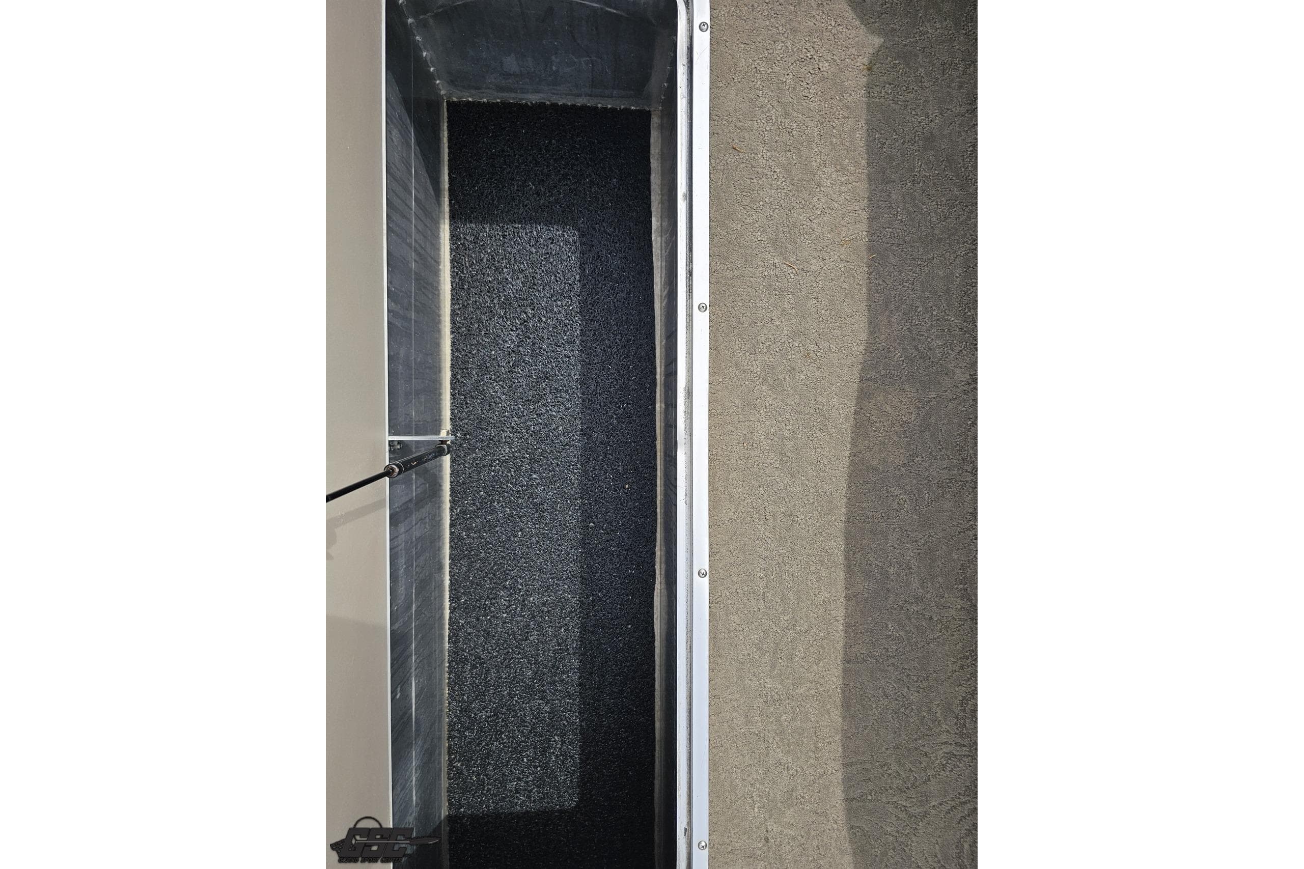 Interior storage compartment of 2012 Harris FloteBote 230 Grand Mariner SEL pontoon boat.