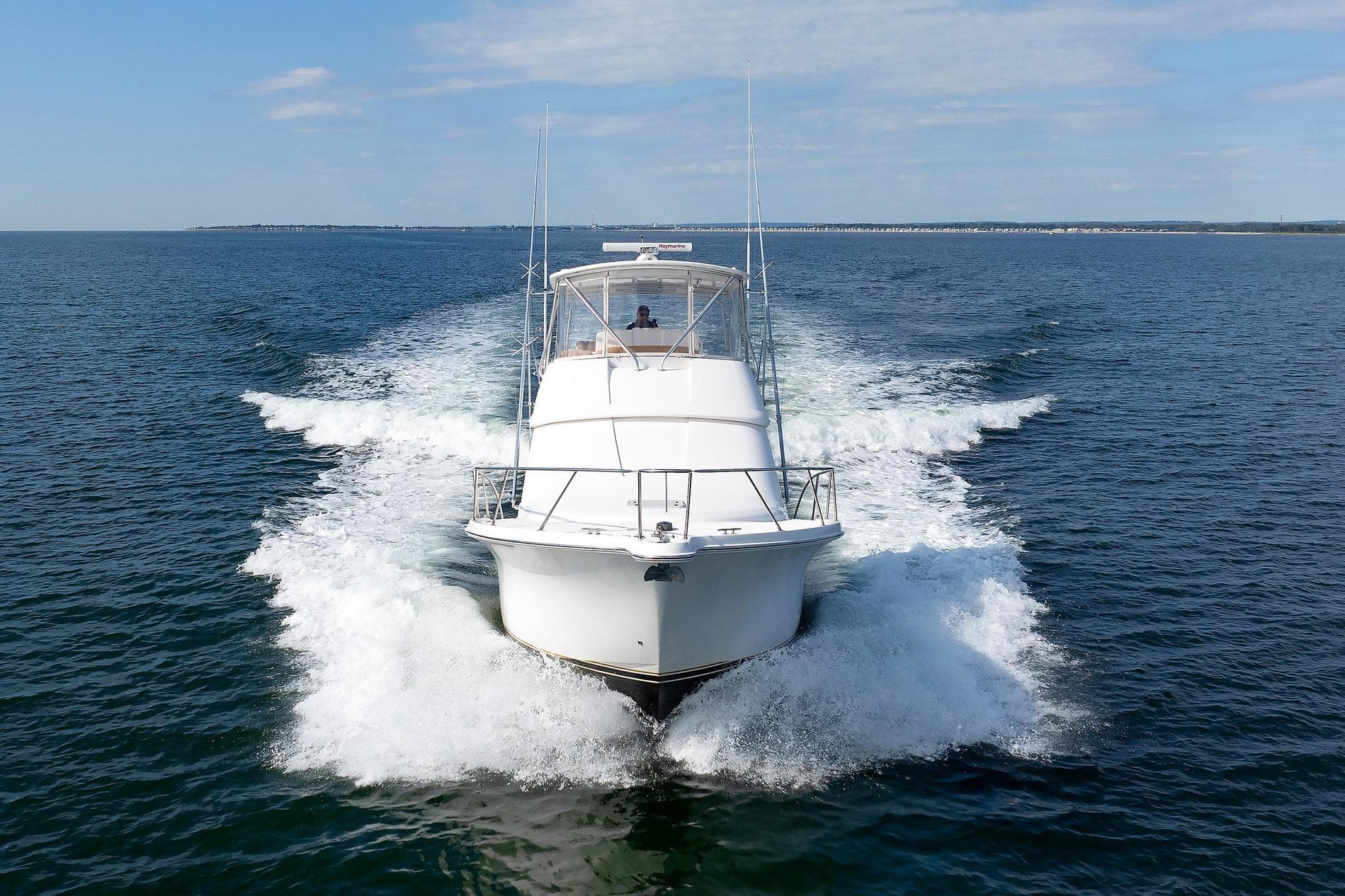 2007 Tiara Yachts 3900 Convertible cruising on open water.