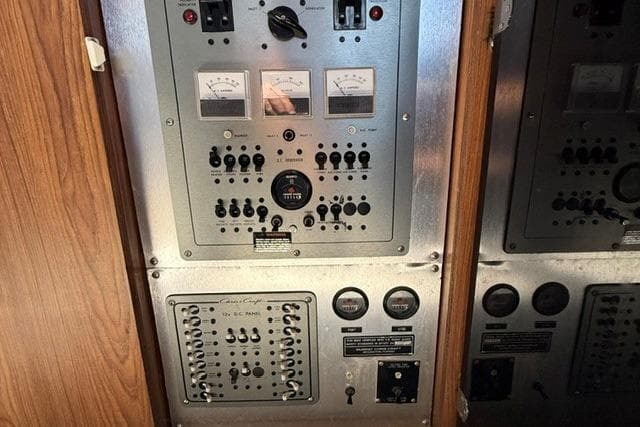 Electrical control panel of a 1988 Chris-Craft 381 Catalina boat.