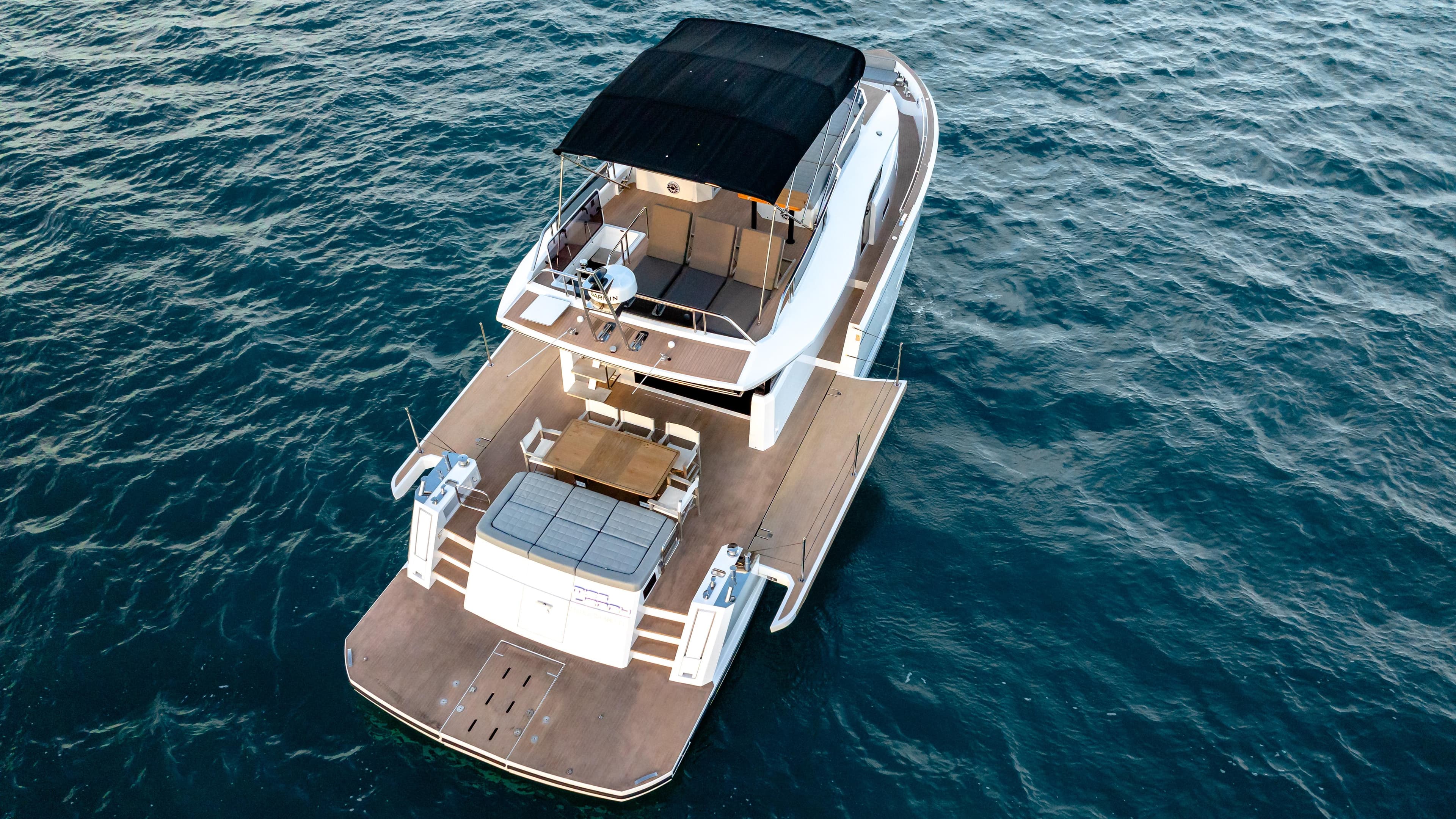 2024 Pardo Yachts E60 luxury yacht on open water, aerial view.