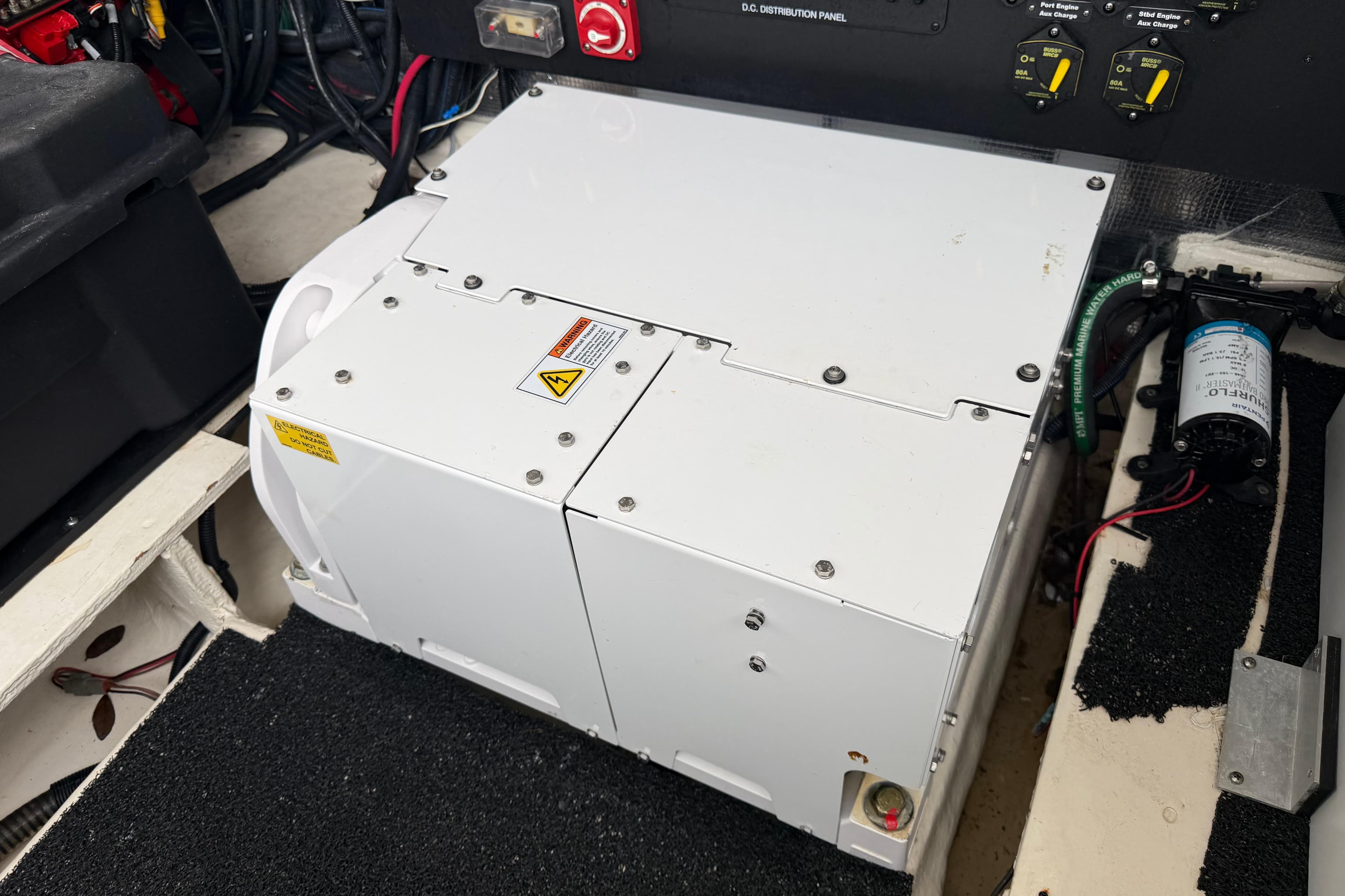 Engine compartment of 2021 Regal 36 XO boat with electrical components and wiring.