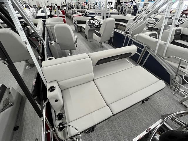 2025 Harris Cruiser 210 interior with plush seating and modern design.