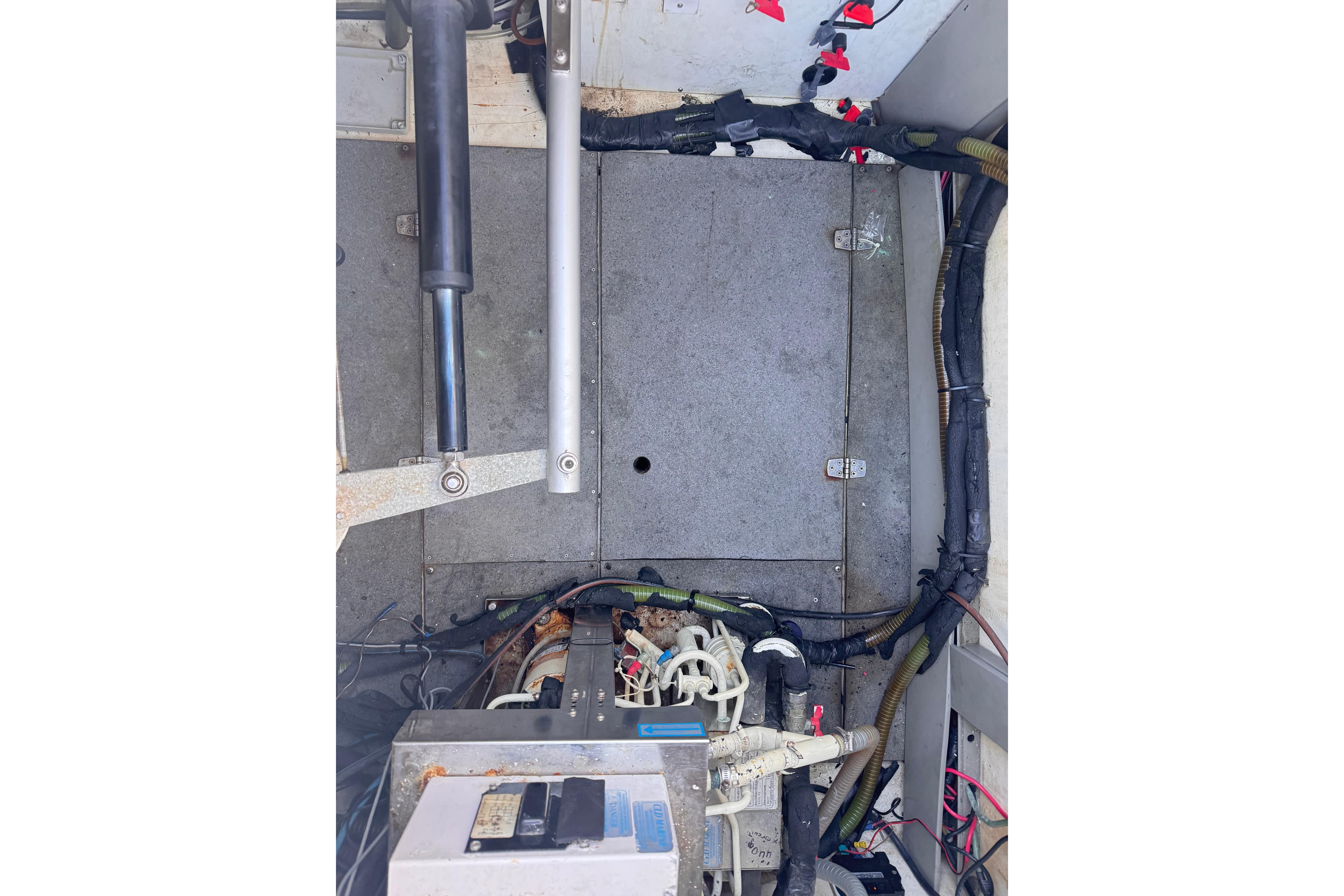 Engine compartment of 2003 Fountaine Pajot Belize 43 catamaran, showing mechanical components.