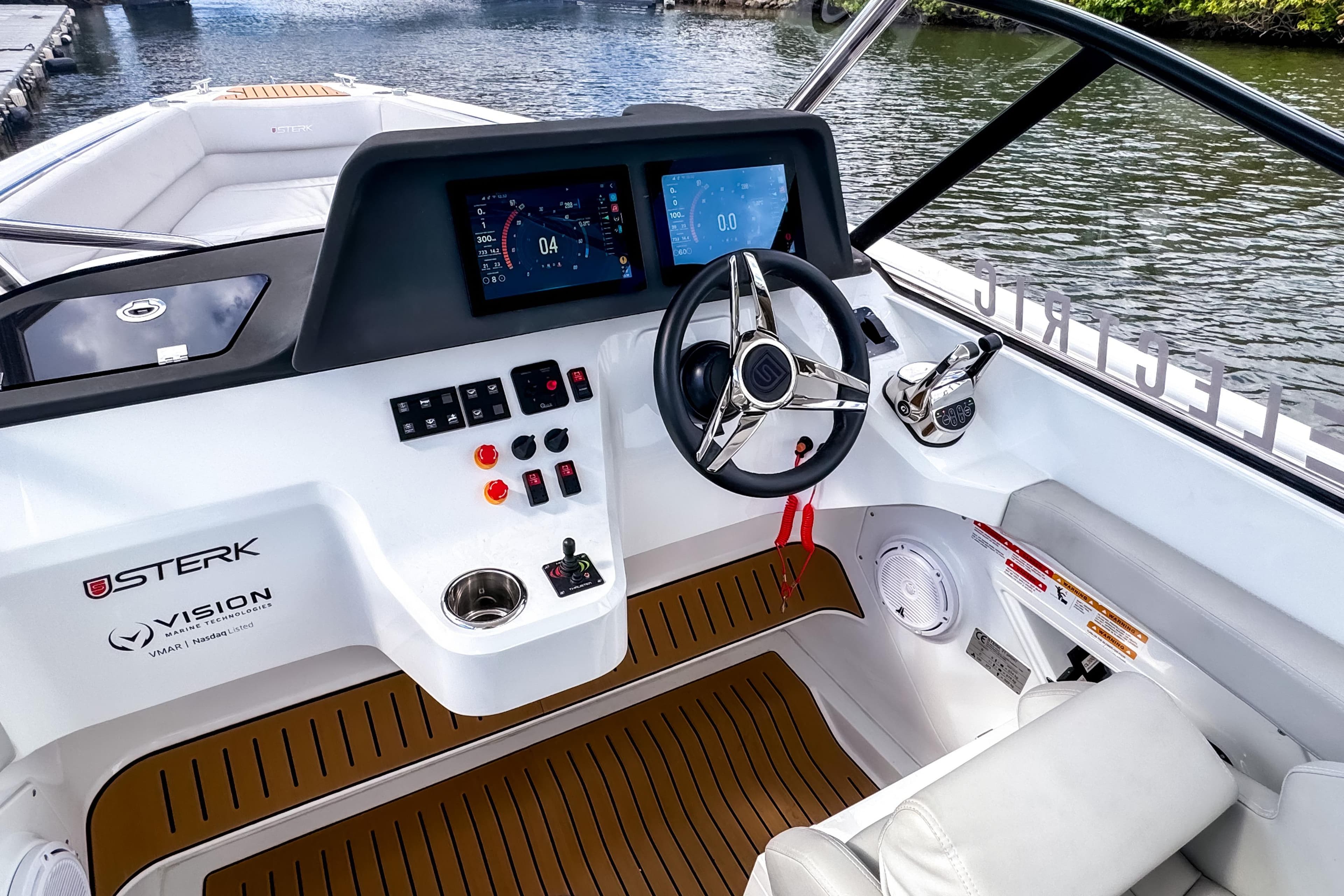 Modern STERK 31 boat cockpit with advanced controls and digital displays, 2025 model.