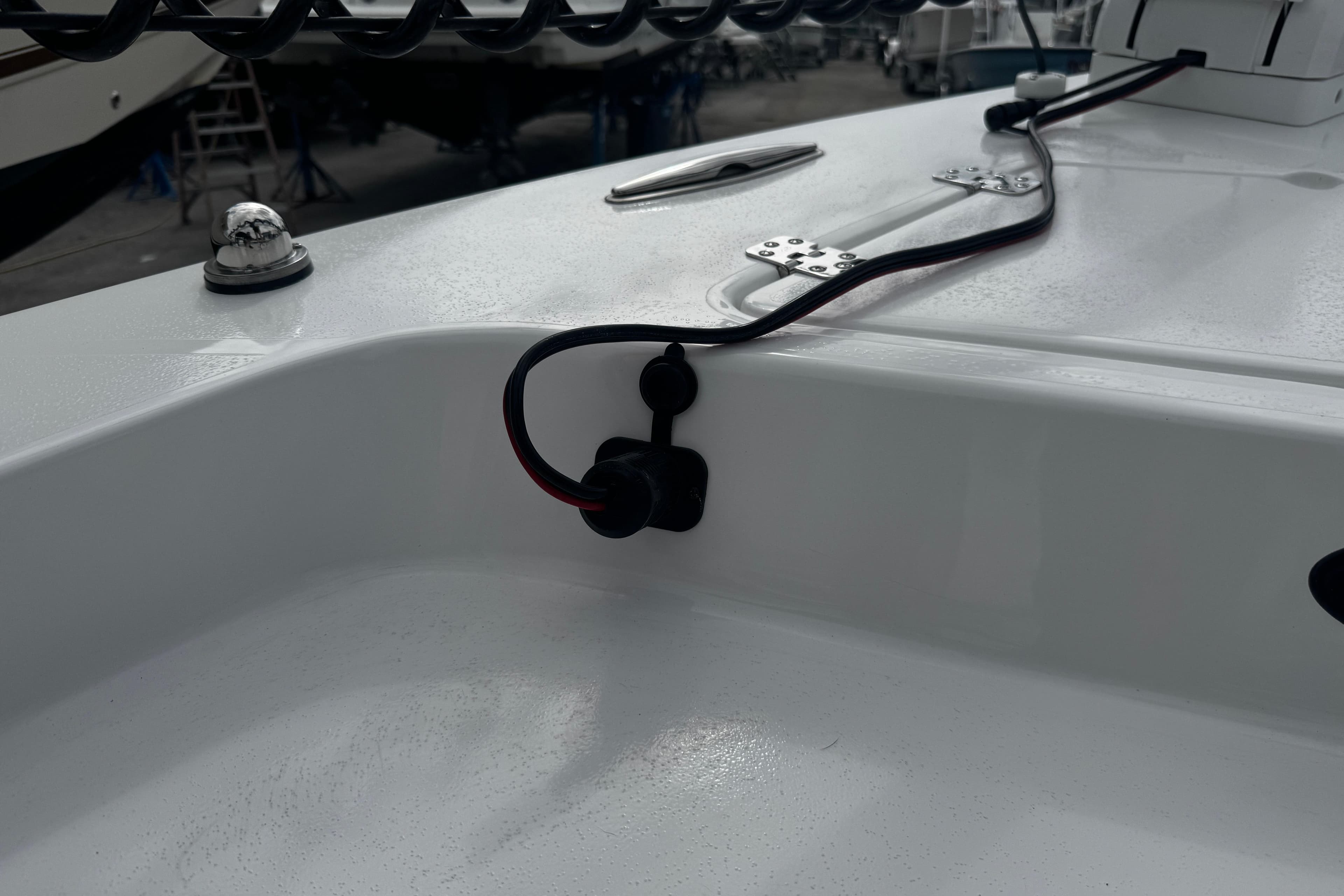 Close-up of 2026 Piranha Casador B2200 boat deck with wiring detail.