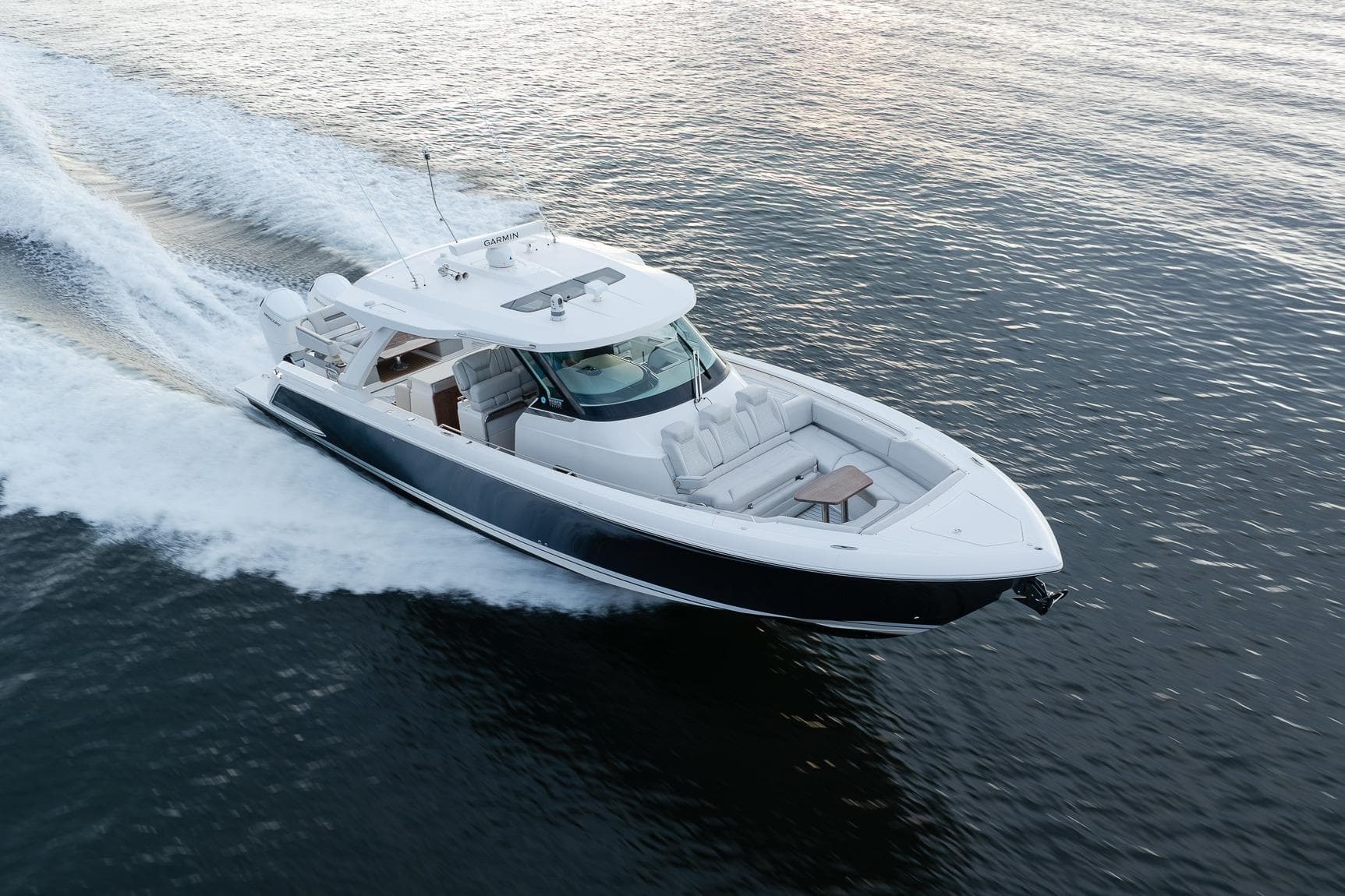 2022 Tiara Sport 43 LS luxury yacht cruising on open water.
