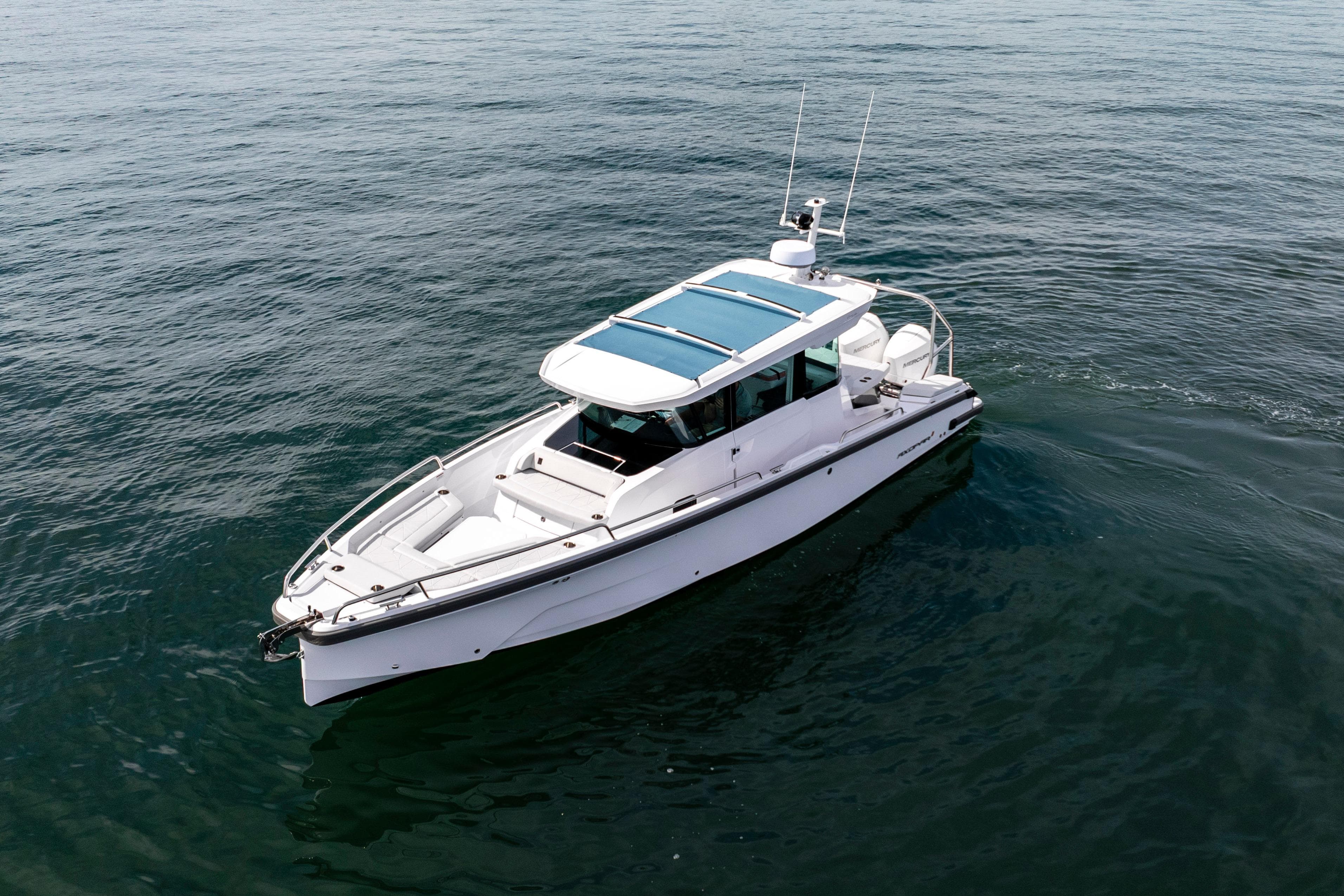 2026 Axopar 29 XC Cross Cabin boat on open water.