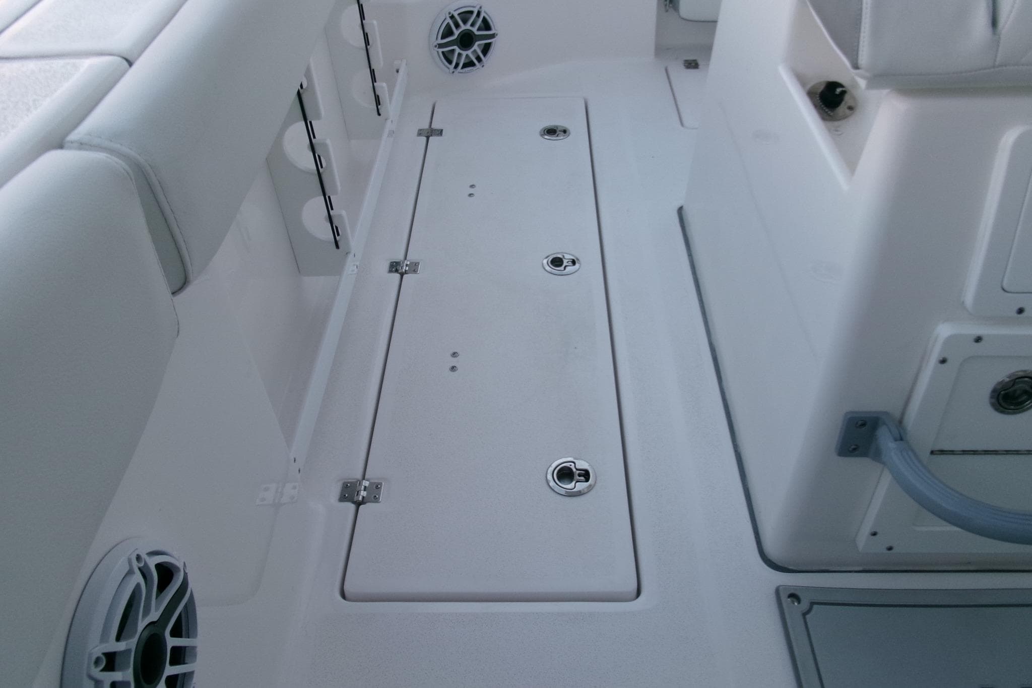 2026 Sea Fox 288 Commander boat interior with storage compartments and speakers.