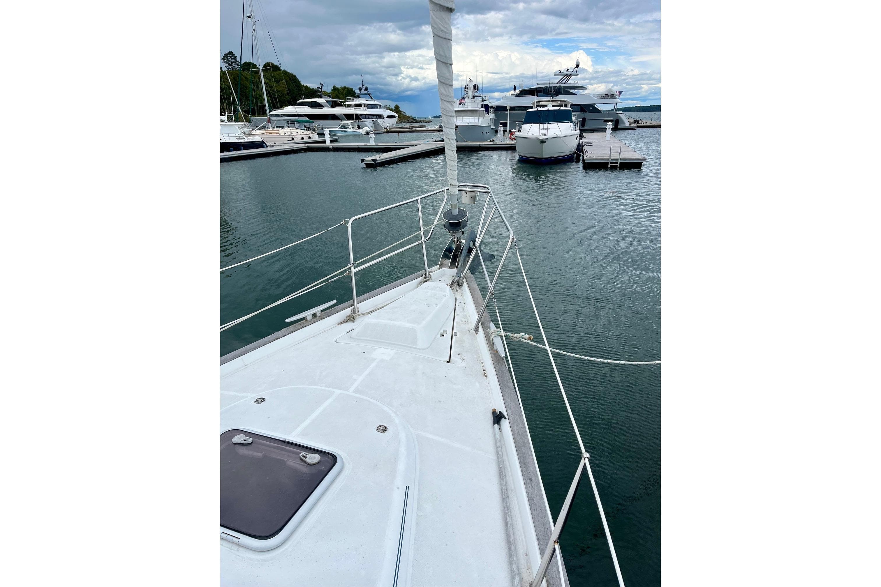 Beneteau Oceanis Clipper 423 sailboat docked in a marina, 2006 model.