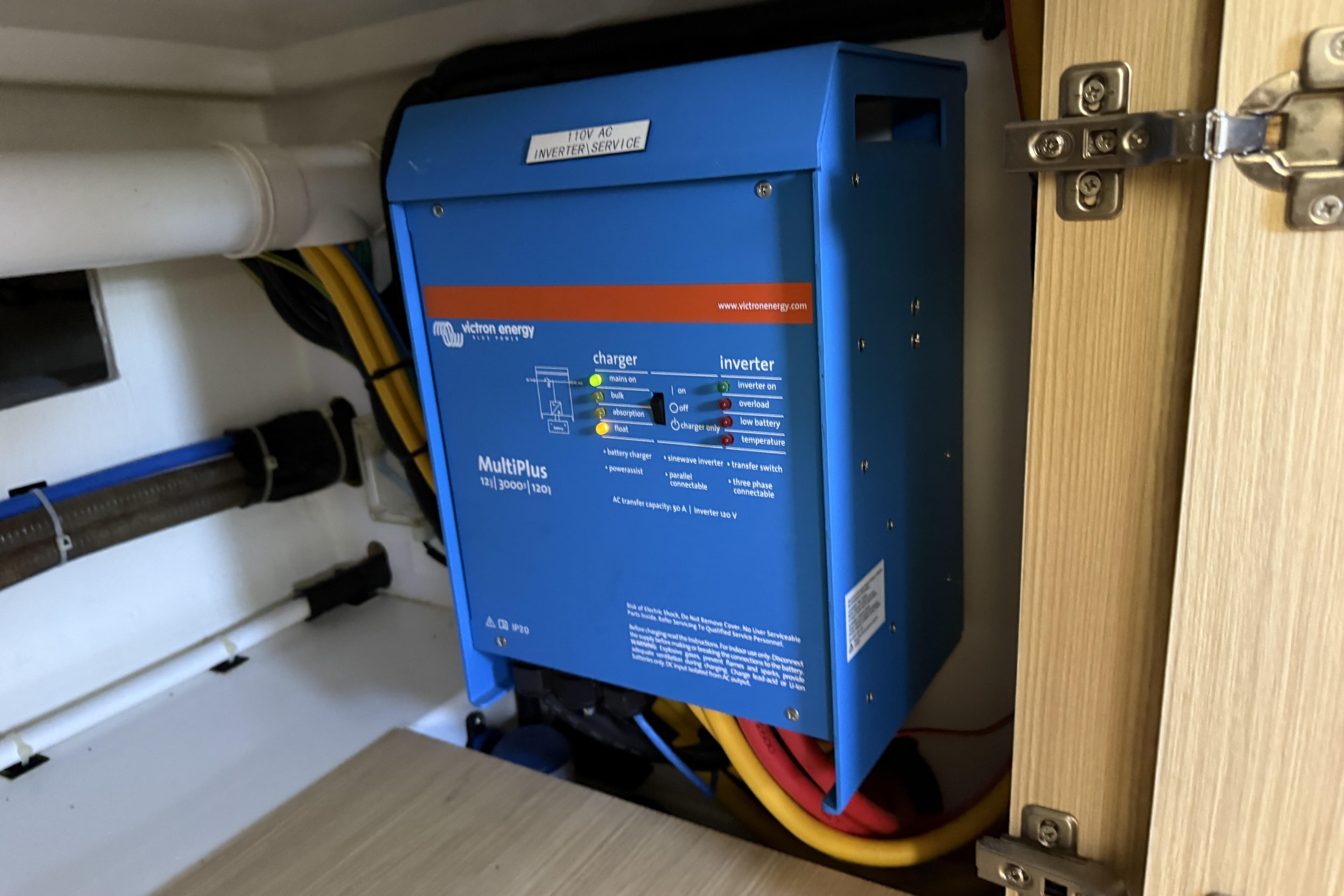Electrical inverter system in 2021 Aquila 36 Sport boat, featuring Victron Energy MultiPlus.