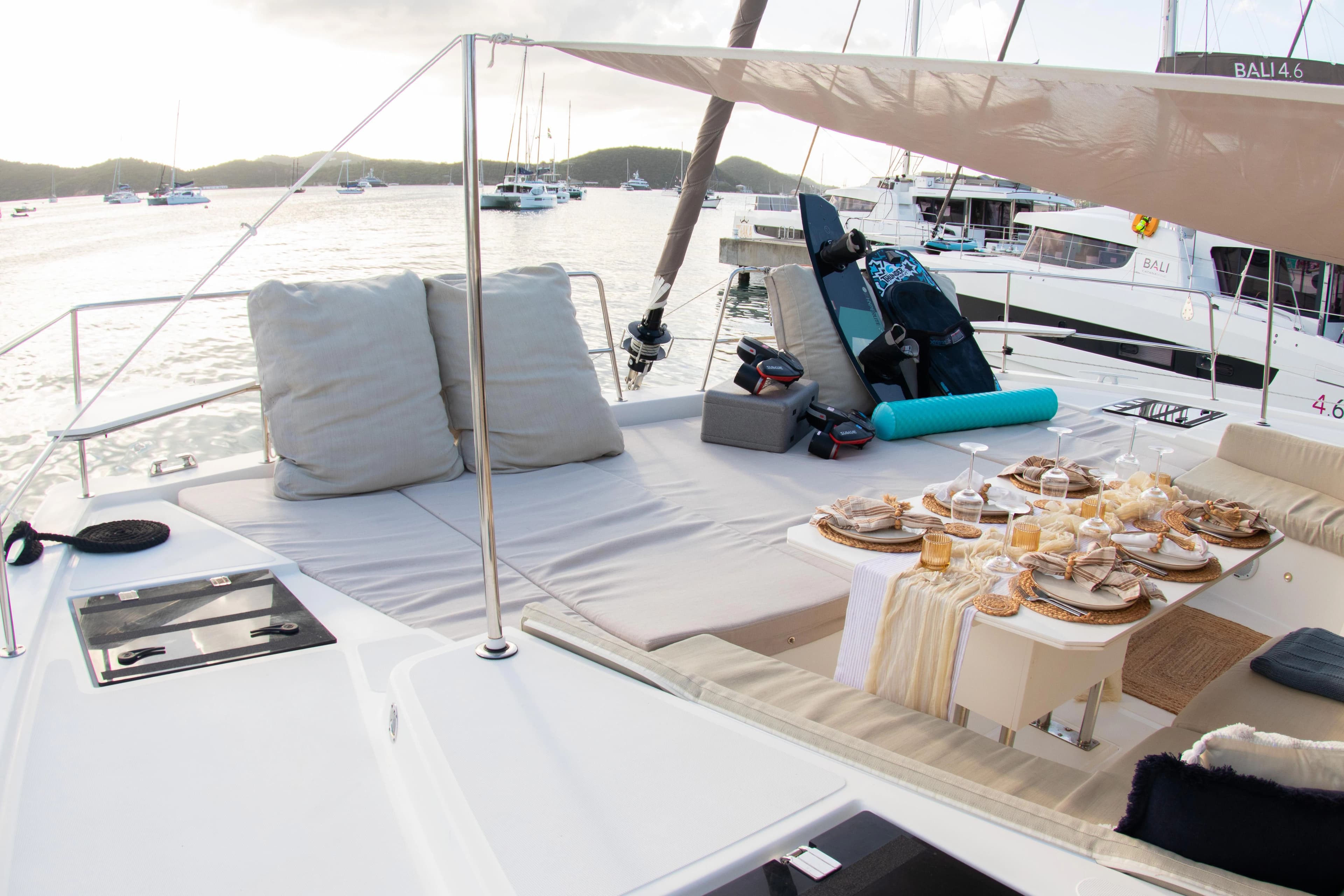 Luxurious Bali 4.8 catamaran deck with set dining table, 2021 model.