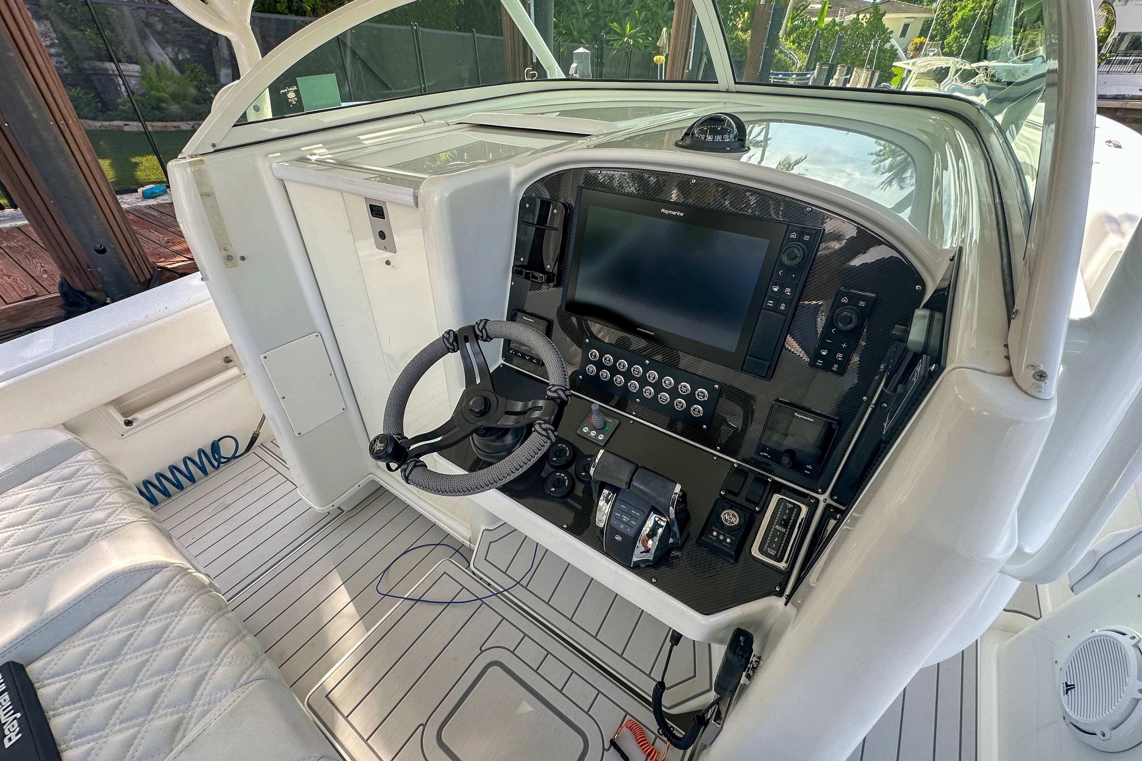 Interior view of 2008 Yellowfin 42 Offshore cockpit with controls.