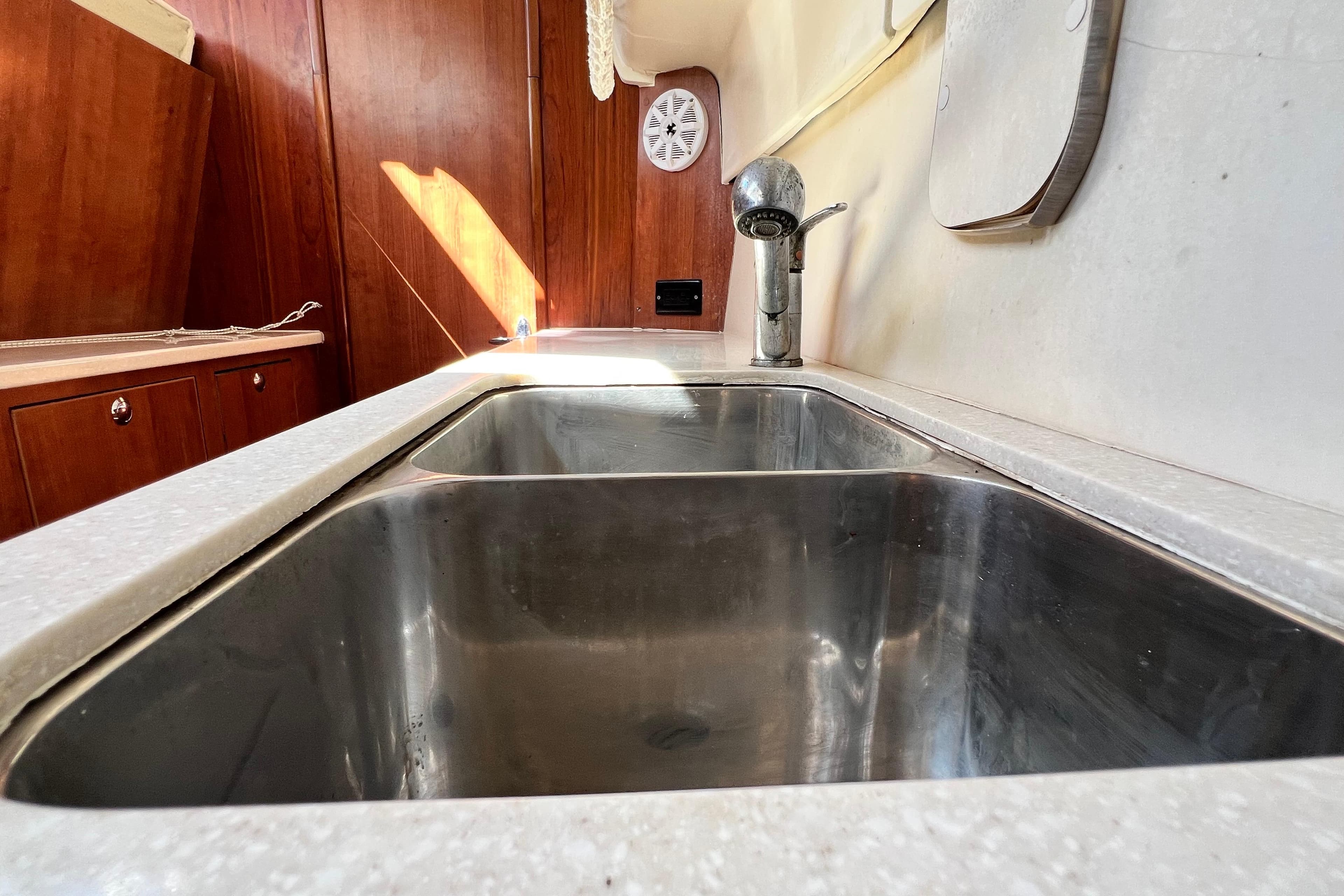Stainless steel sink in 2013 Gemini Legacy 35 yacht kitchen interior.