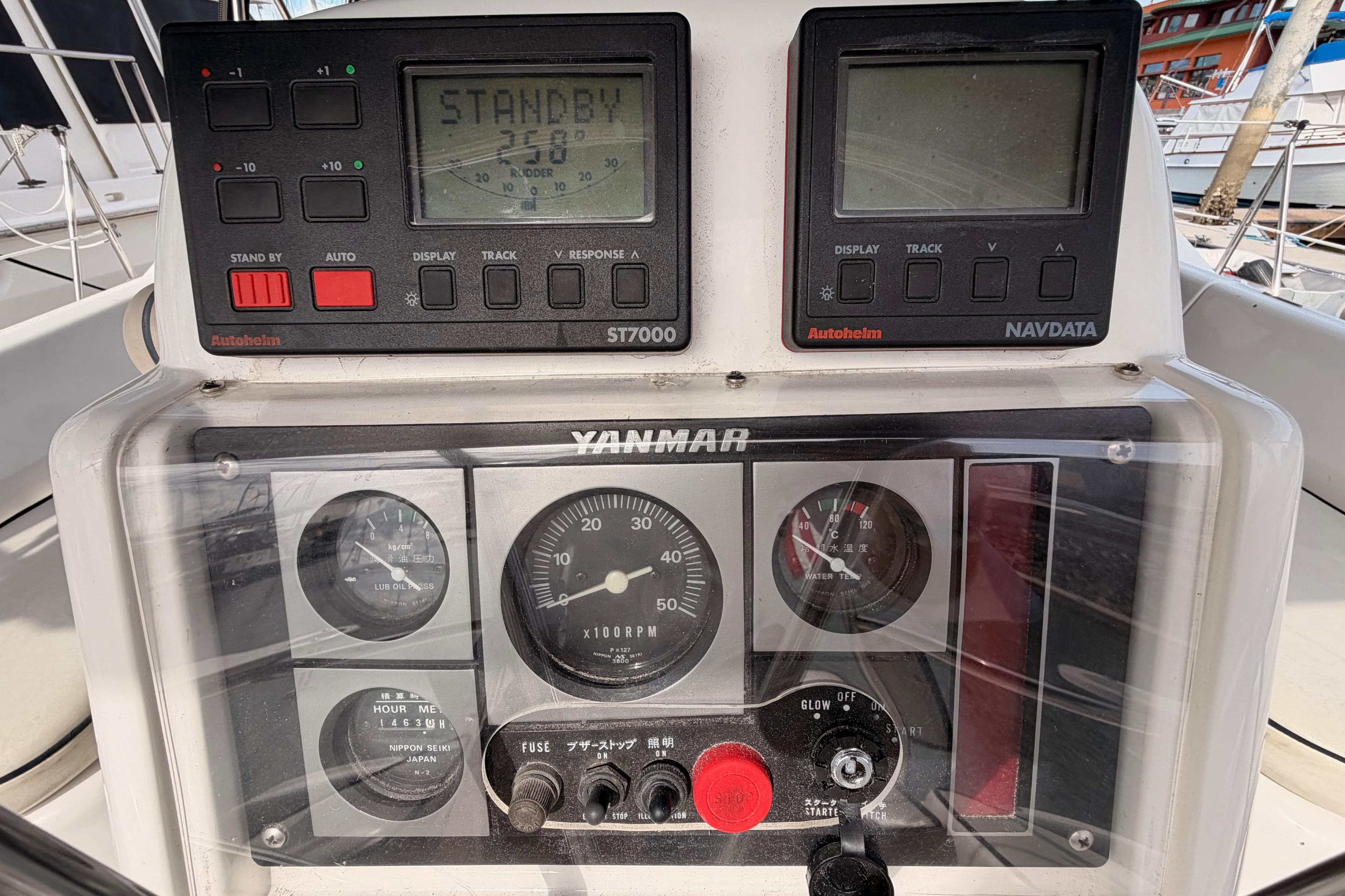 Control panel of a 1998 Hunter Legend 40.5 sailboat with Yanmar engine gauges.