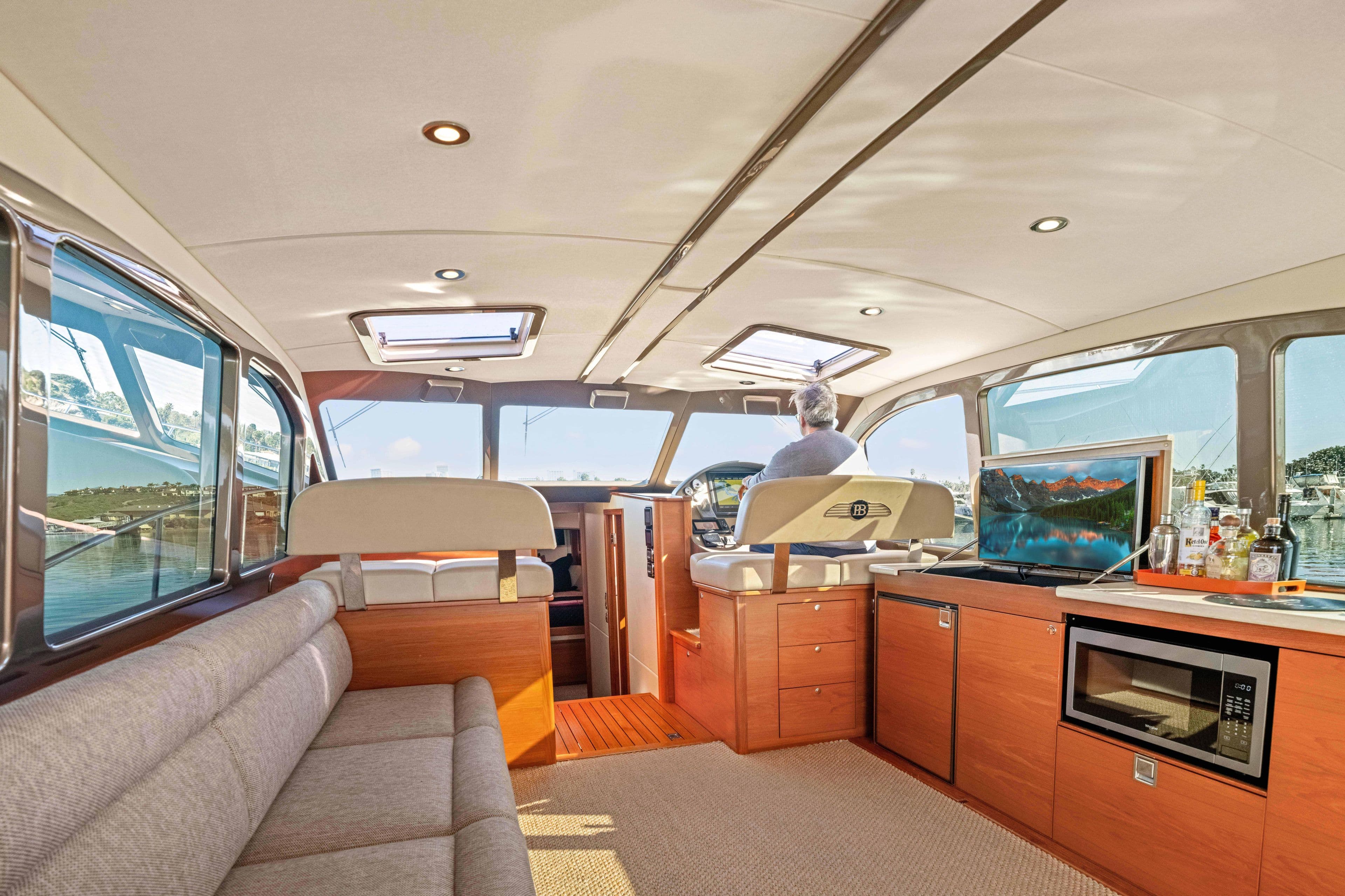 Luxurious interior of 2015 Palm Beach Motor Yachts PB45 with modern amenities and scenic views.