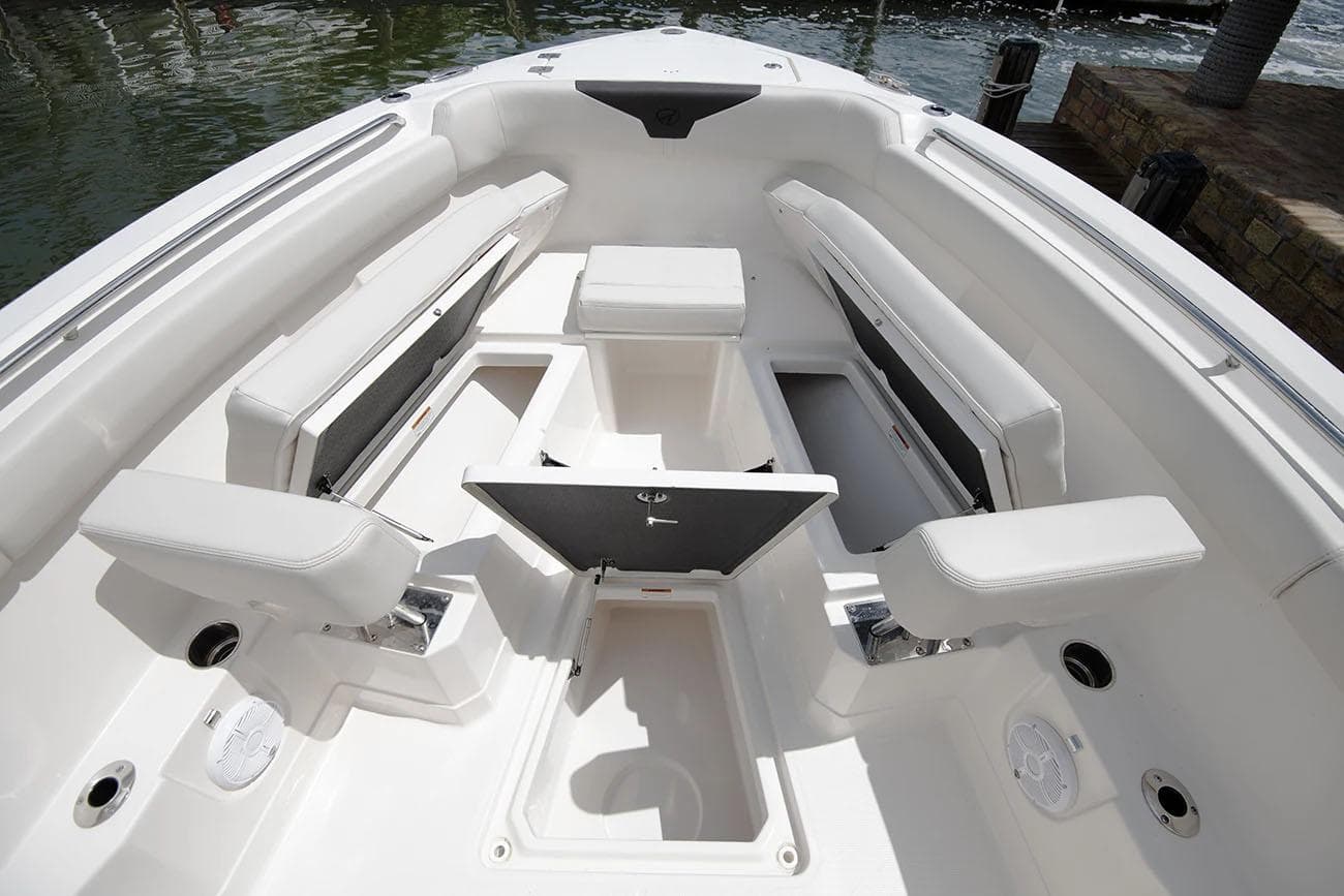 Manufacturer Provided Image: 2026 Sailfish 272 CC boat interior with white seating and storage compartments.