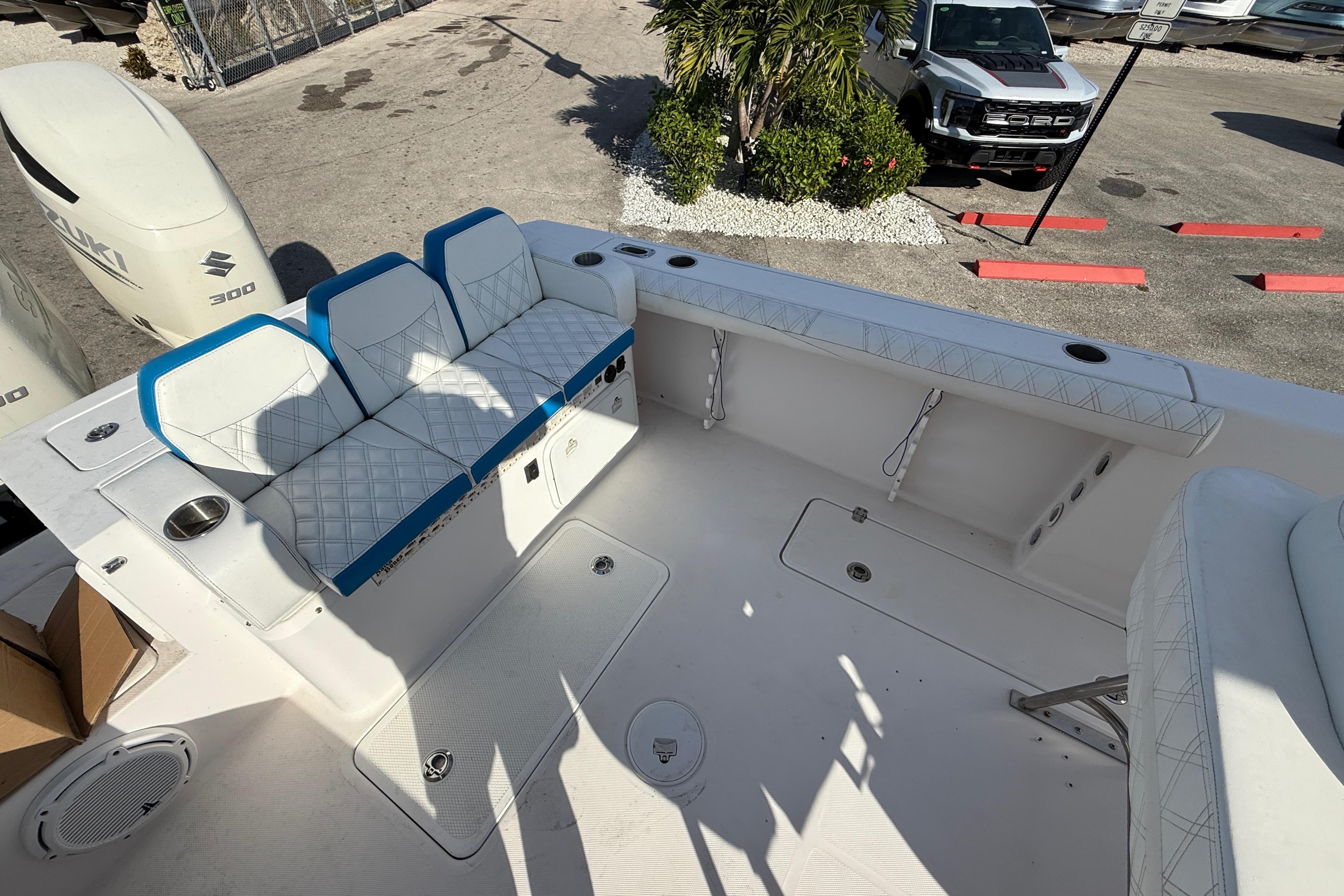 2016 Pro-Line 35 Super Sport boat interior with seating and Suzuki 300 engines.