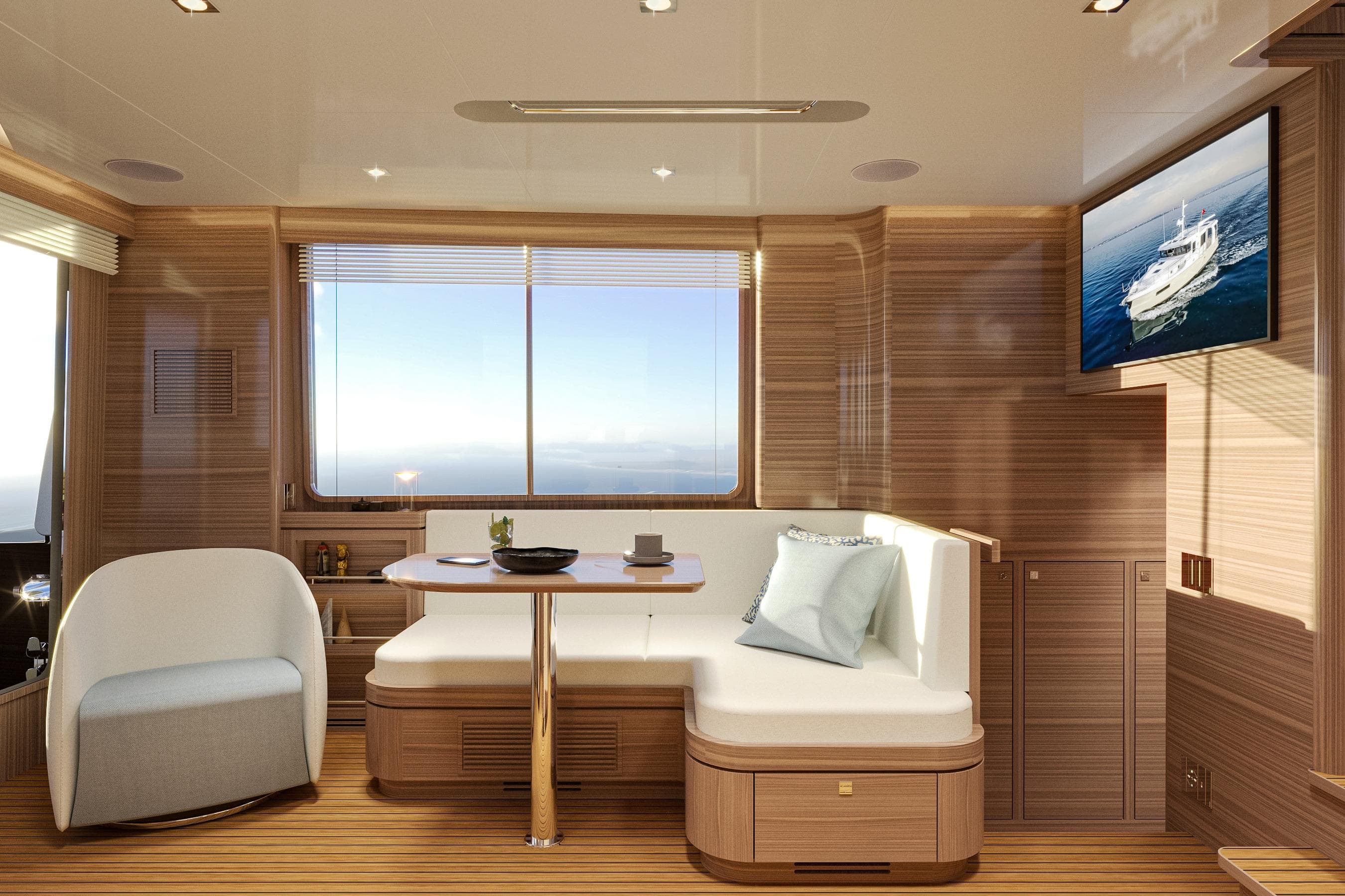 Luxurious interior of 2026 Nordhavn 46 yacht with modern seating and ocean view.