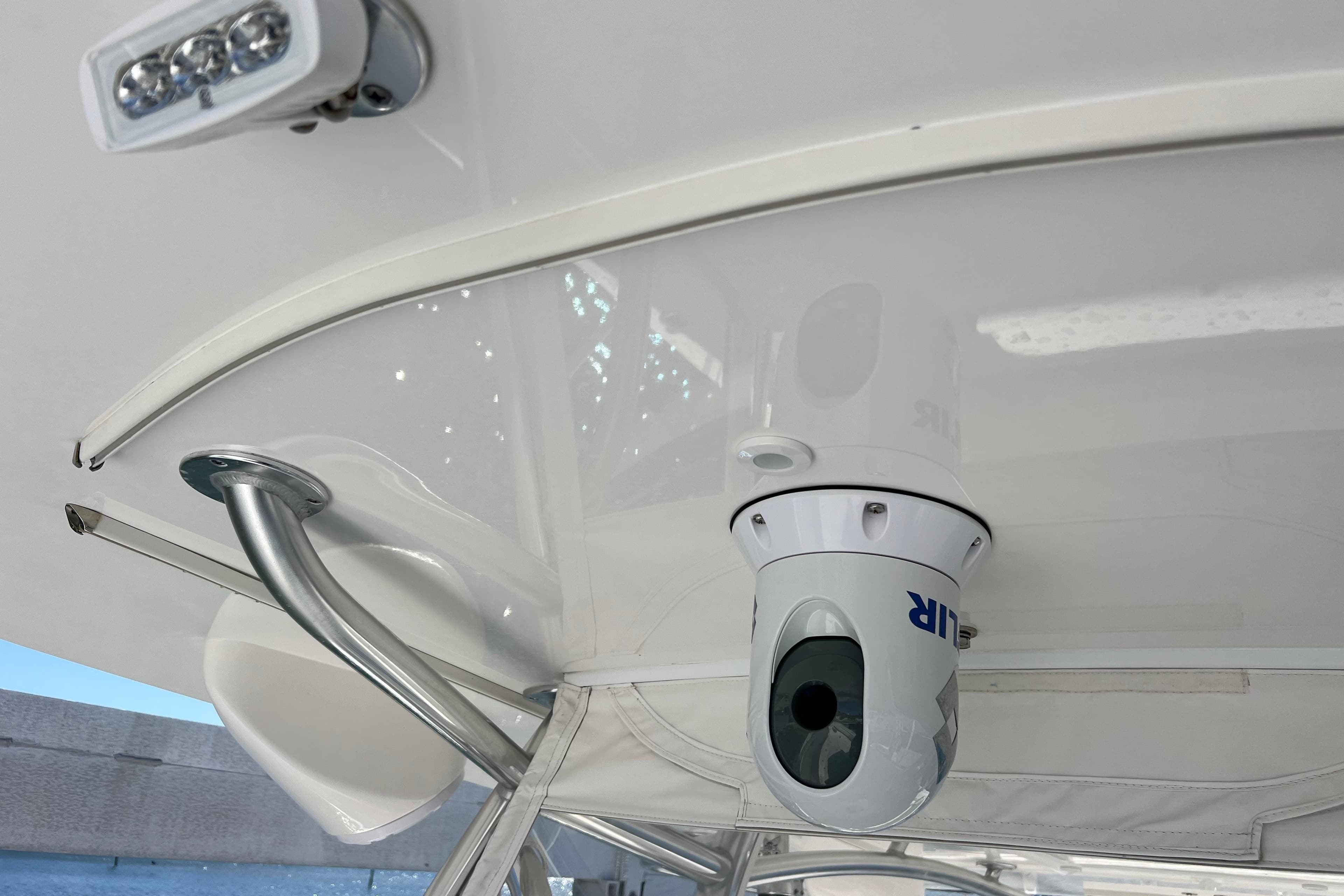 2023 Contender 39 ST boat with mounted FLIR camera and LED light on the ceiling.