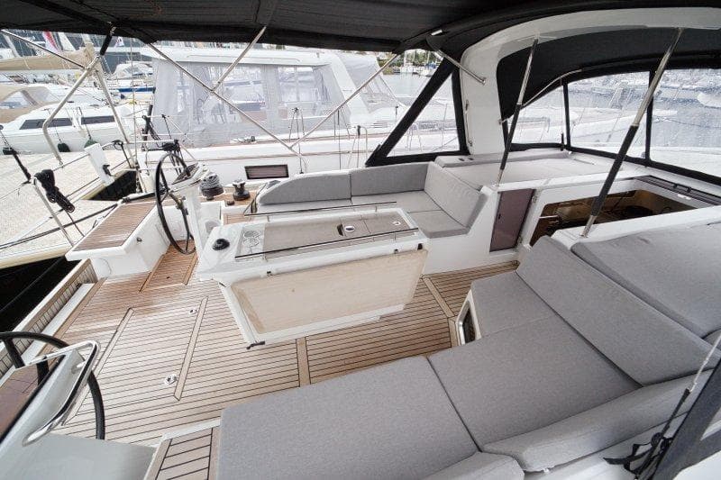 Luxurious 2022 Beneteau Oceanis 51.1 yacht cockpit with sleek seating and modern design.