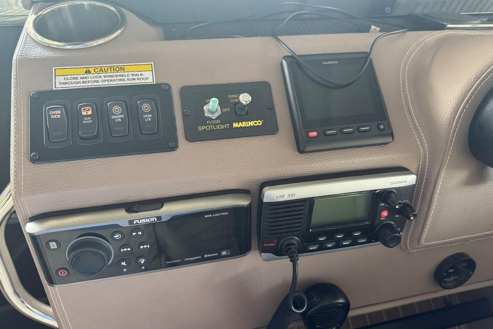 Control panel of a 2016 Regal 46 Sport Coupe with various navigation and communication devices.