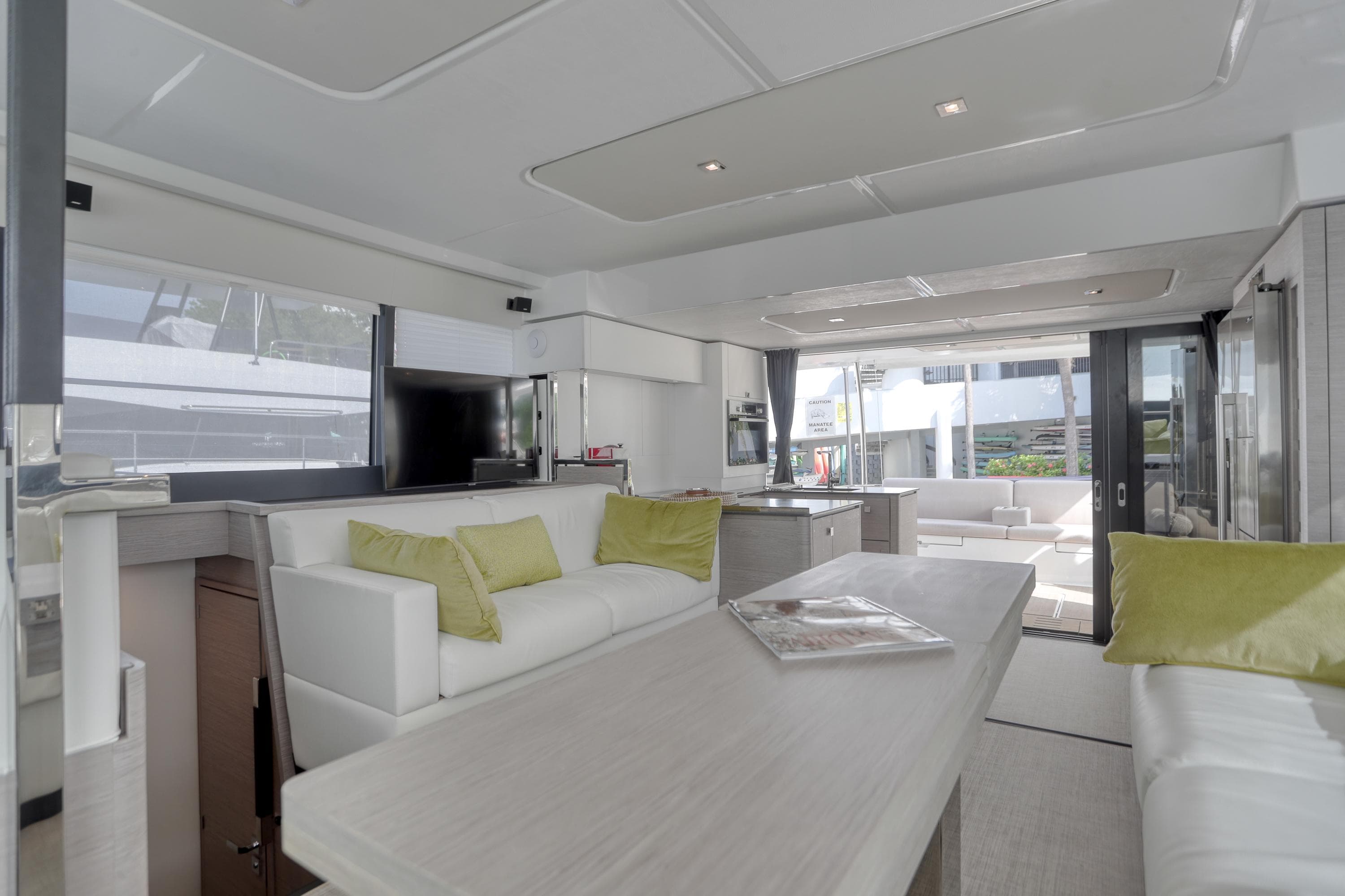 Luxurious interior of 2022 Fountaine Pajot MY6 yacht with modern furnishings and ample natural light.