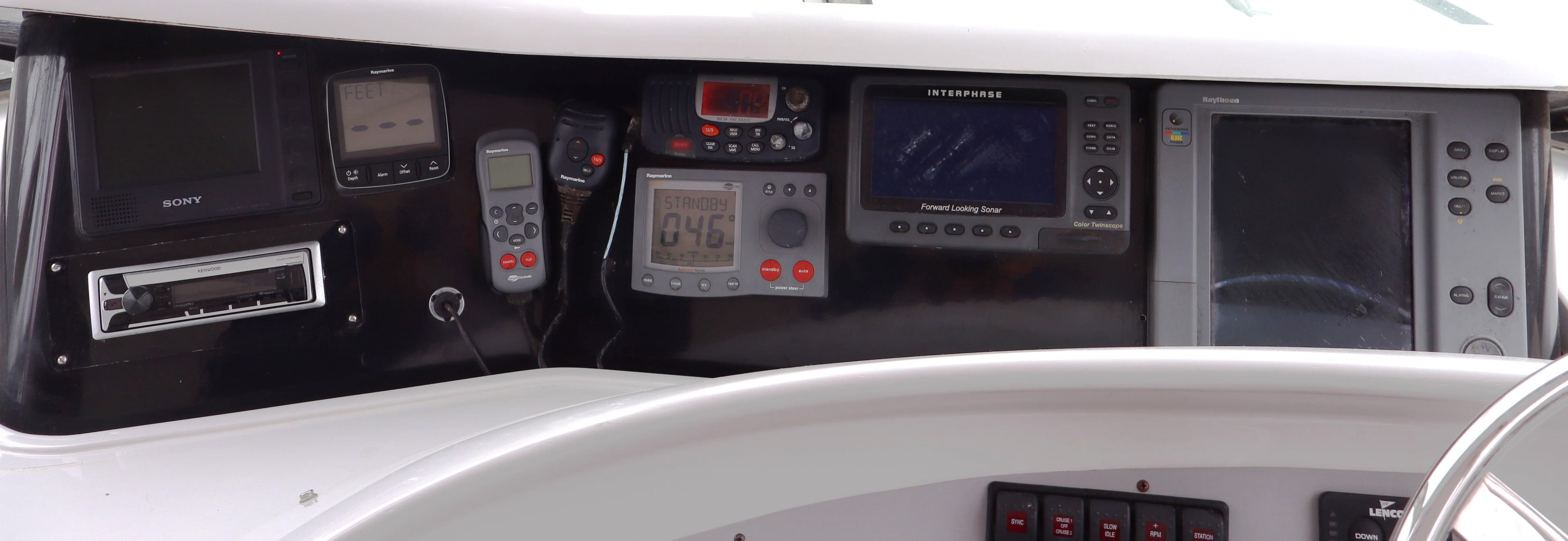 Control panel of a 2006 Bluewater Yachts 5200, featuring navigation and communication equipment.