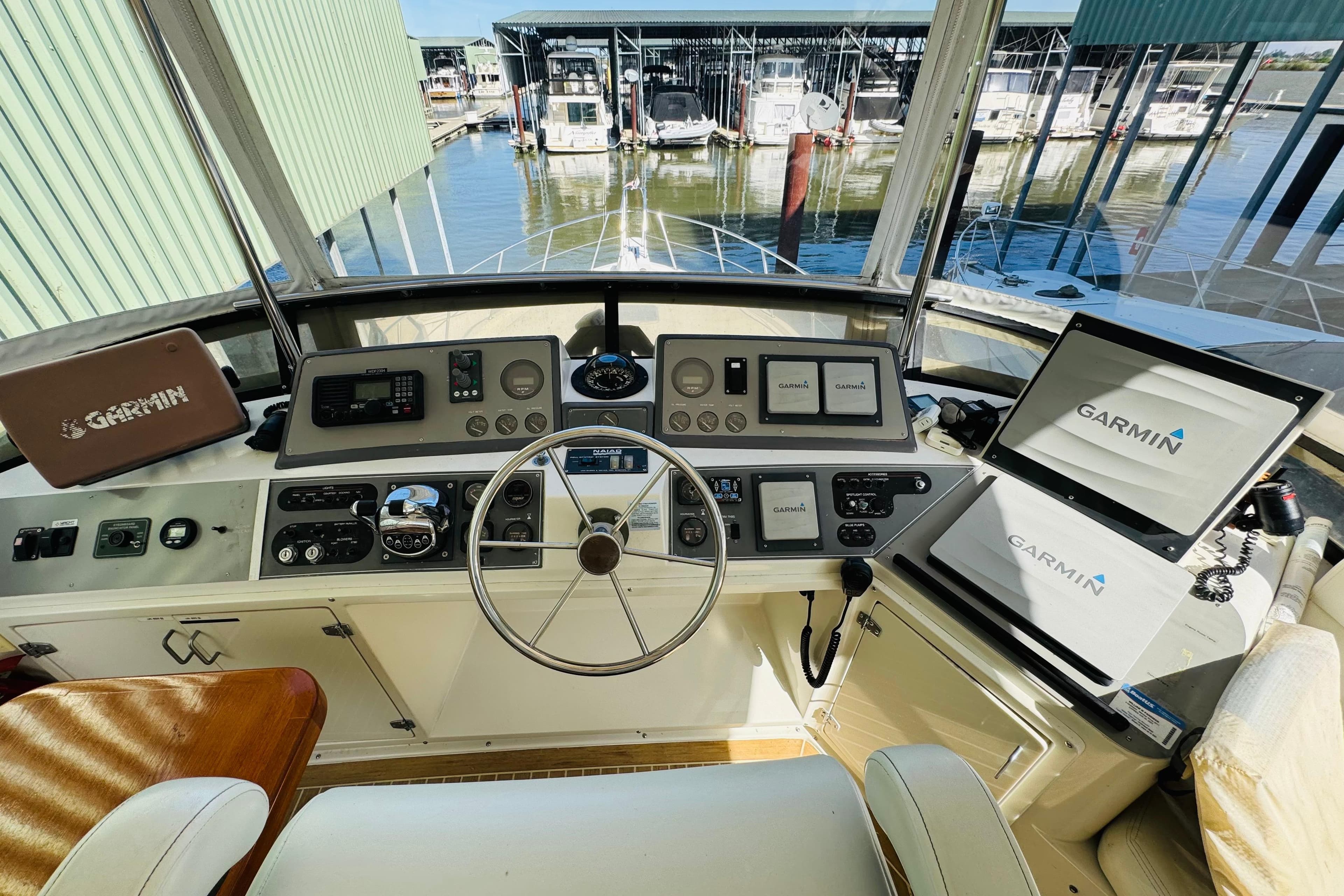 Cockpit view of 1991 Californian 55 Motor Yacht with Garmin navigation systems.