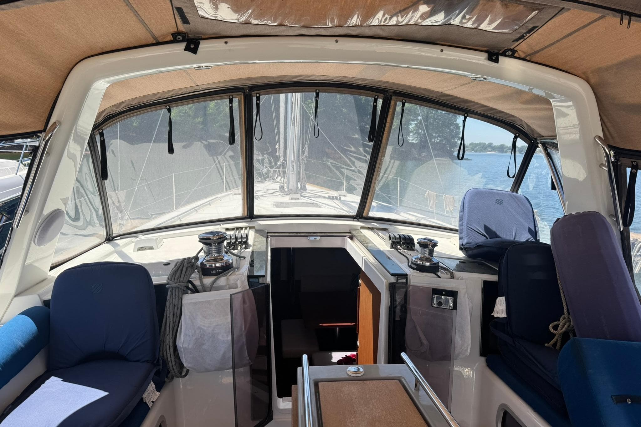 Interior view of 2014 Beneteau Oceanis 45 sailboat cockpit with seating and winches.