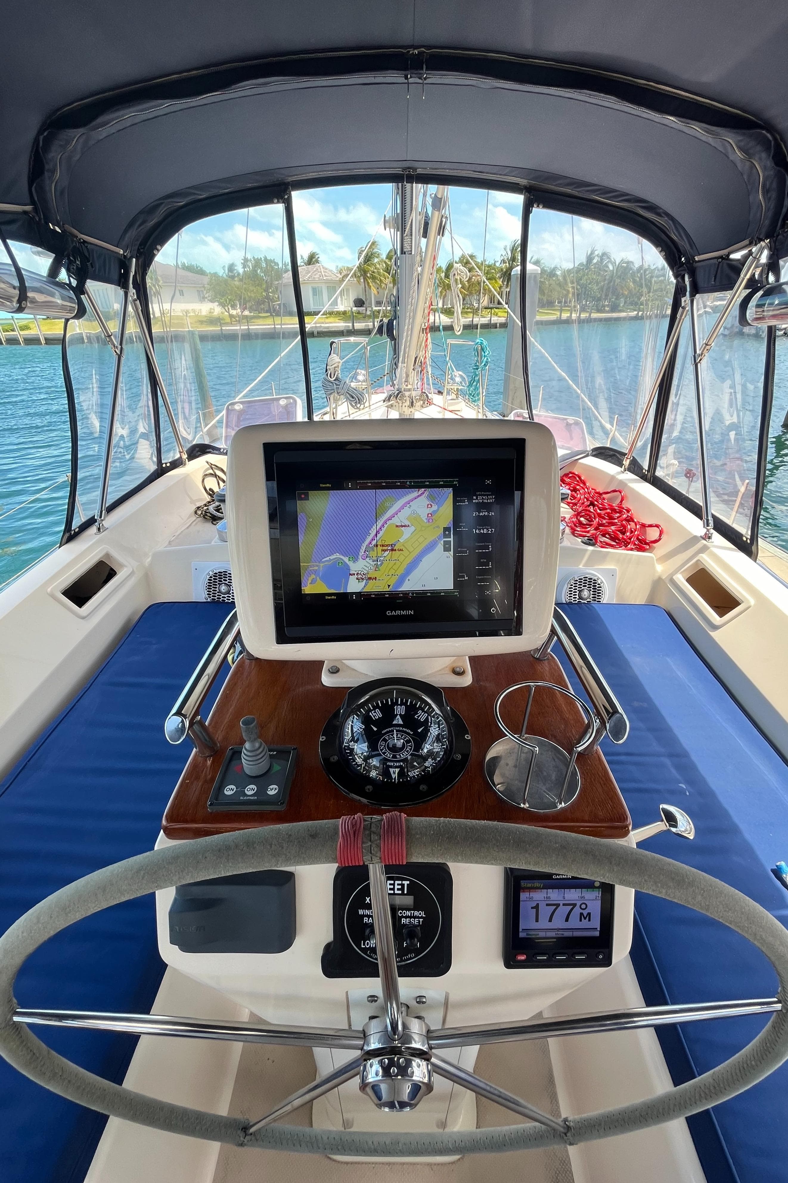 2006 Island Packet 445 yacht cockpit with navigation equipment and steering wheel.