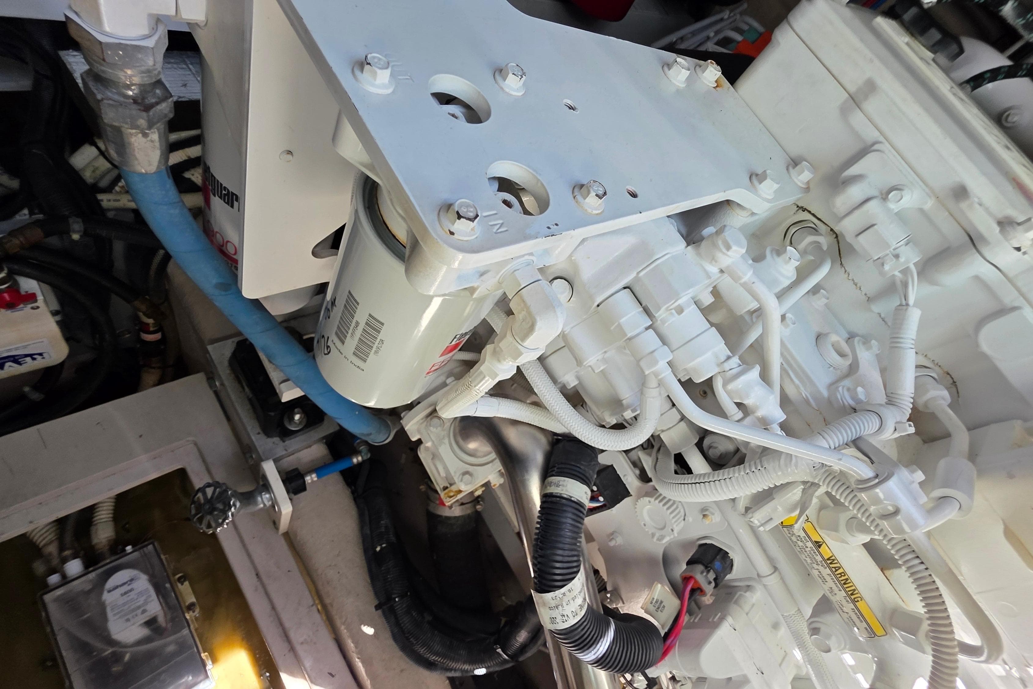 Engine compartment of a 2018 Sea Ray Sundancer 510 yacht, showcasing mechanical components.