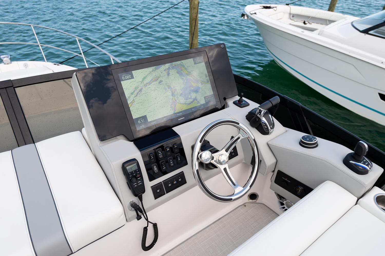 Manufacturer Provided Image: Helm of 2026 Regal 38 FXO boat with navigation display and controls.