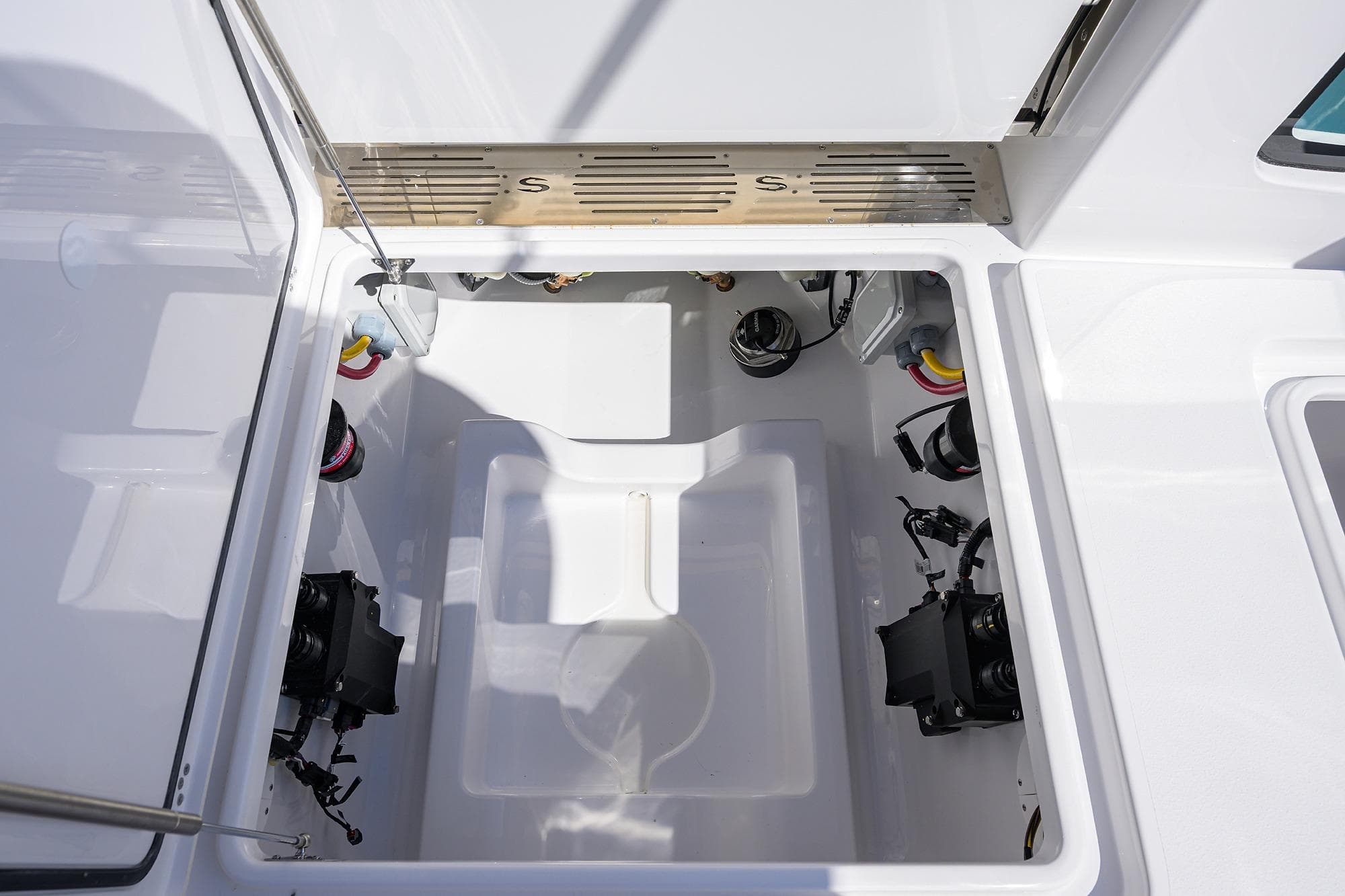 2026 Sportsman Open 302 Center Console boat interior compartment view.