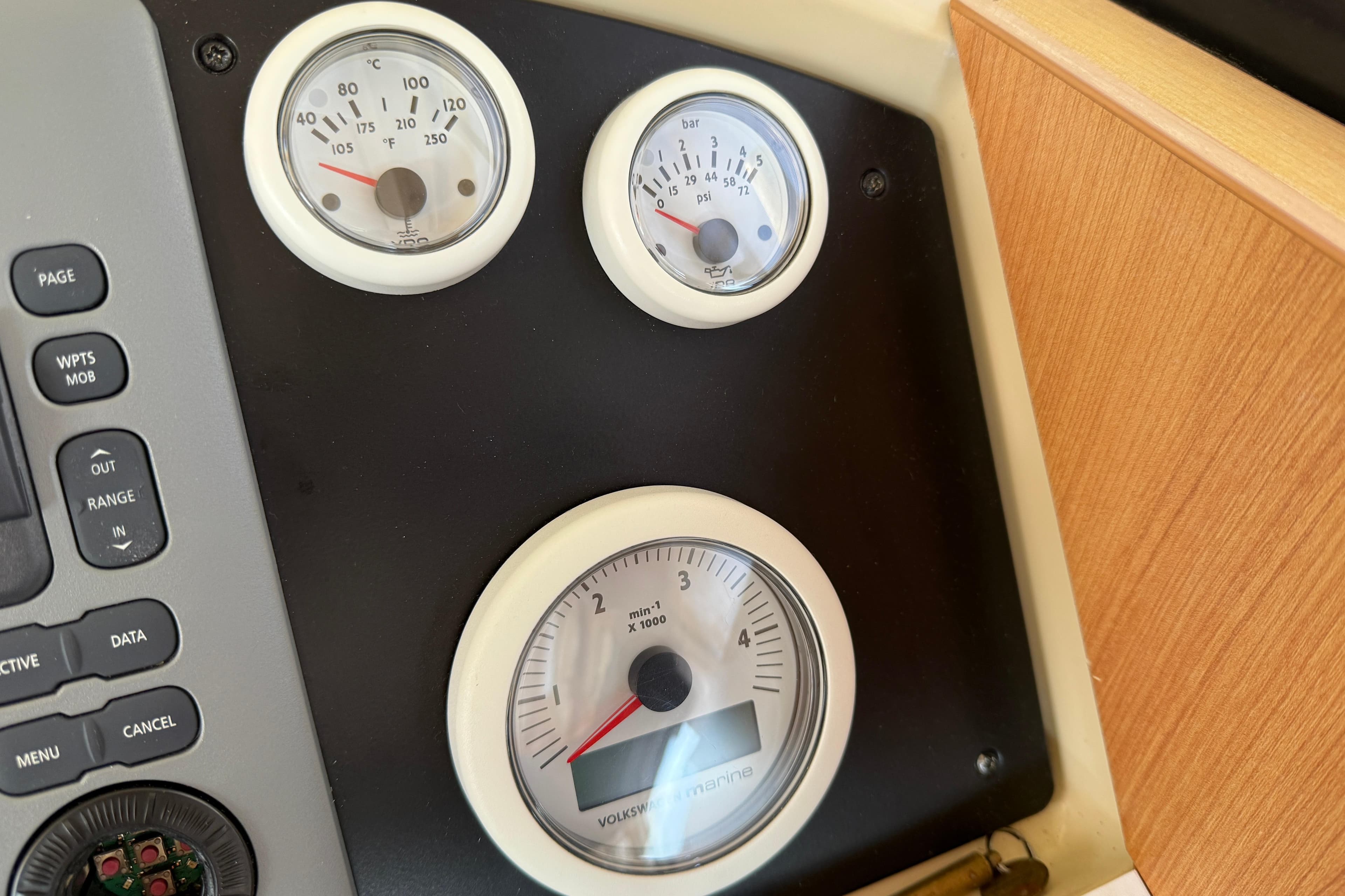 Instrument panel of a 2013 Greenline 33 boat with gauges and controls.