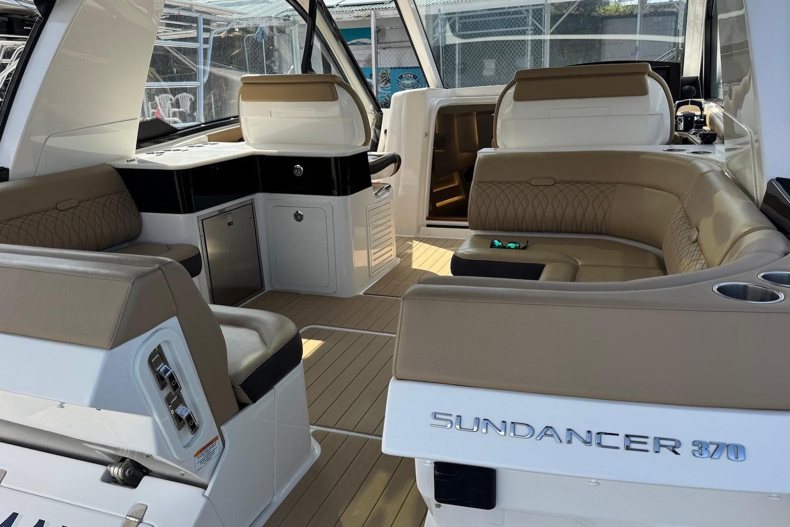 2022 Sea Ray Sundancer 370 Outboard interior with luxurious seating and modern design.