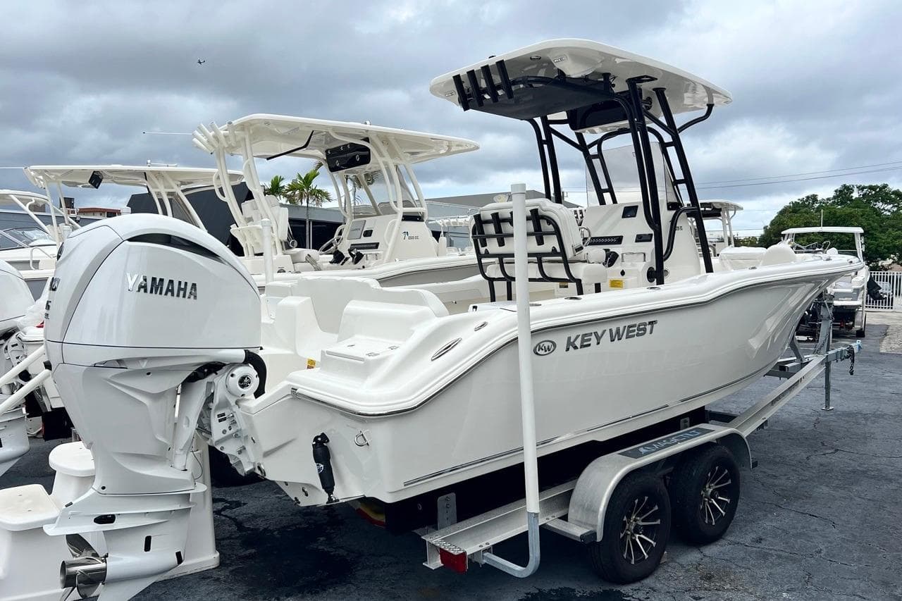2026 Key West 239 FS boat with Yamaha engine on trailer, overcast sky.