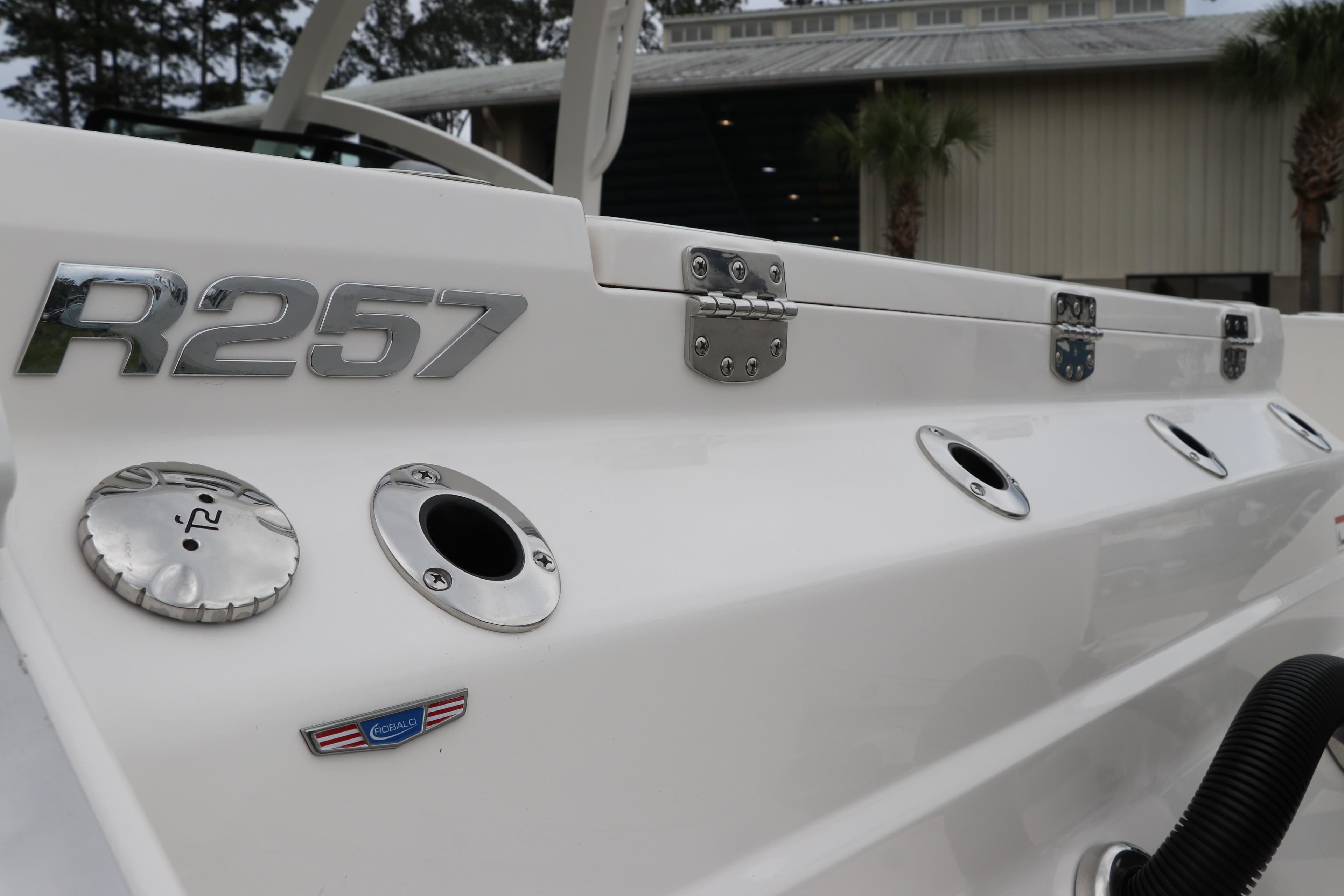 2026 Robalo R257 Dual Console boat, showcasing sleek design and metallic details.