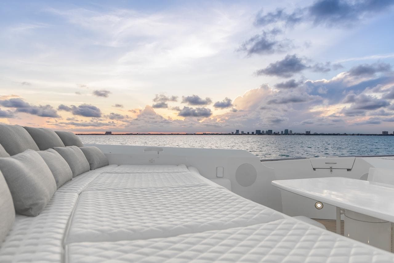 Luxurious Sunseeker Predator 108 yacht deck with ocean view at sunset, 2008 model.