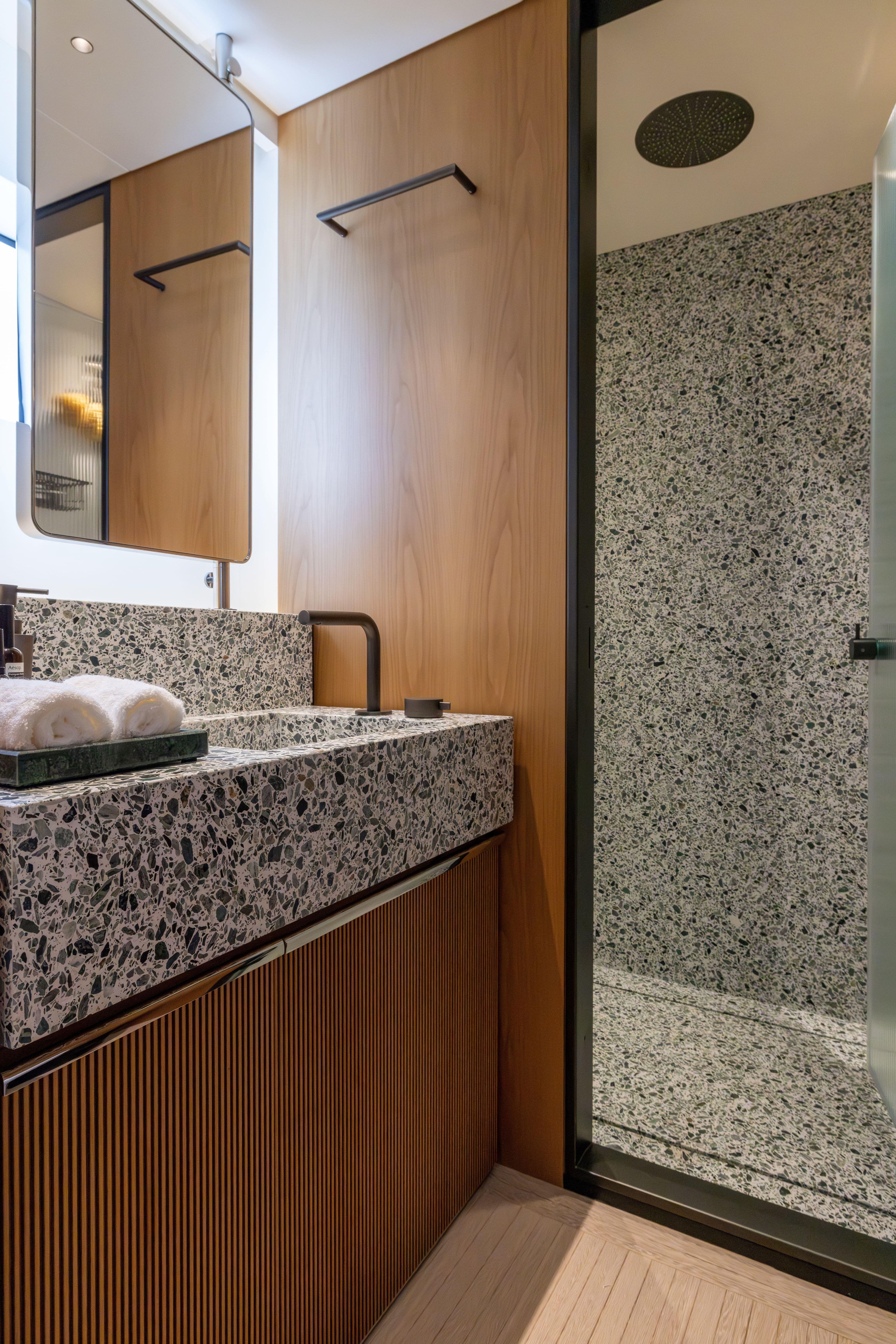 Luxurious bathroom in 2024 Benetti Oasis 34M yacht with modern design and elegant finishes.