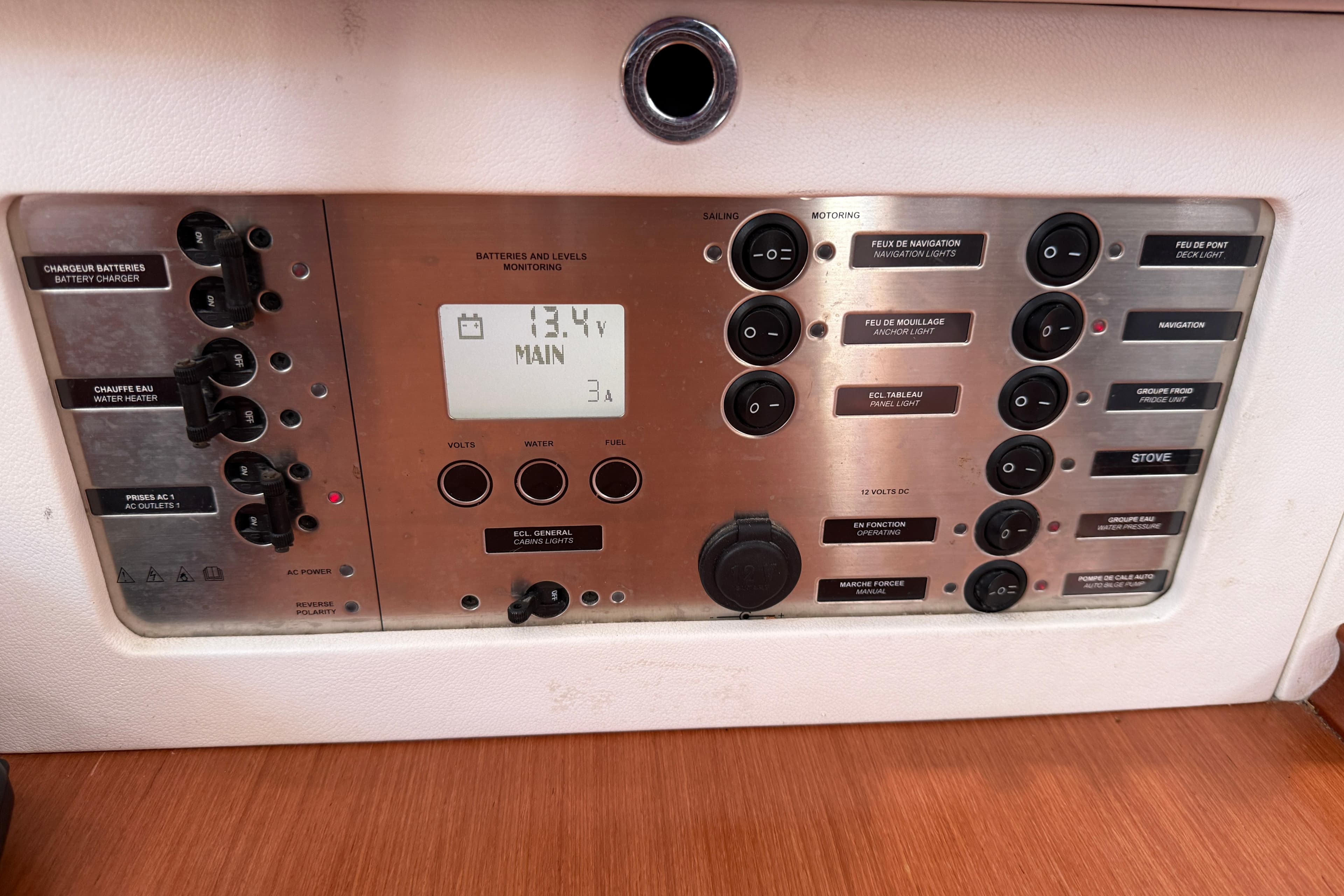 Control panel of a 2010 Beneteau Oceanis 43 sailboat, displaying battery and system monitoring.