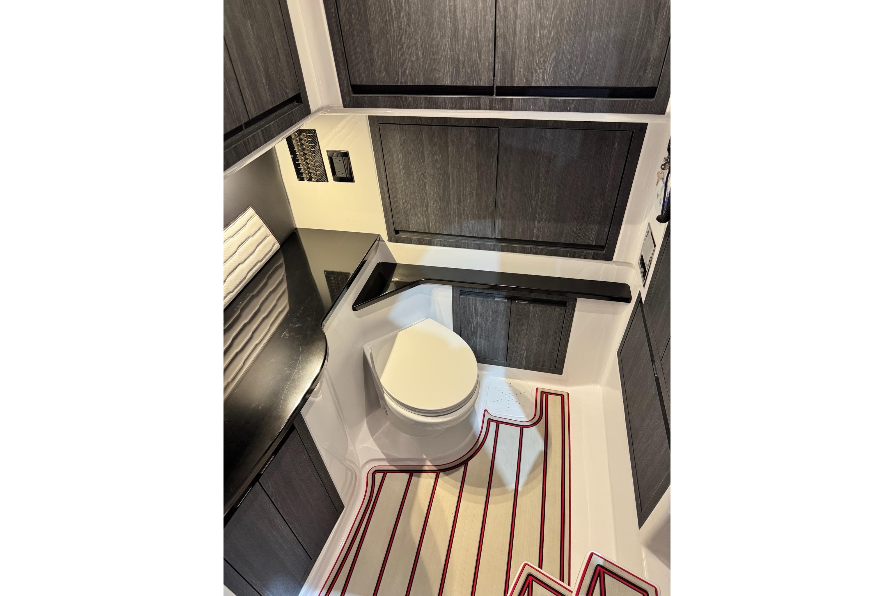 Luxurious bathroom interior of 2024 Cigarette 41' Nighthawk SD Edition boat.