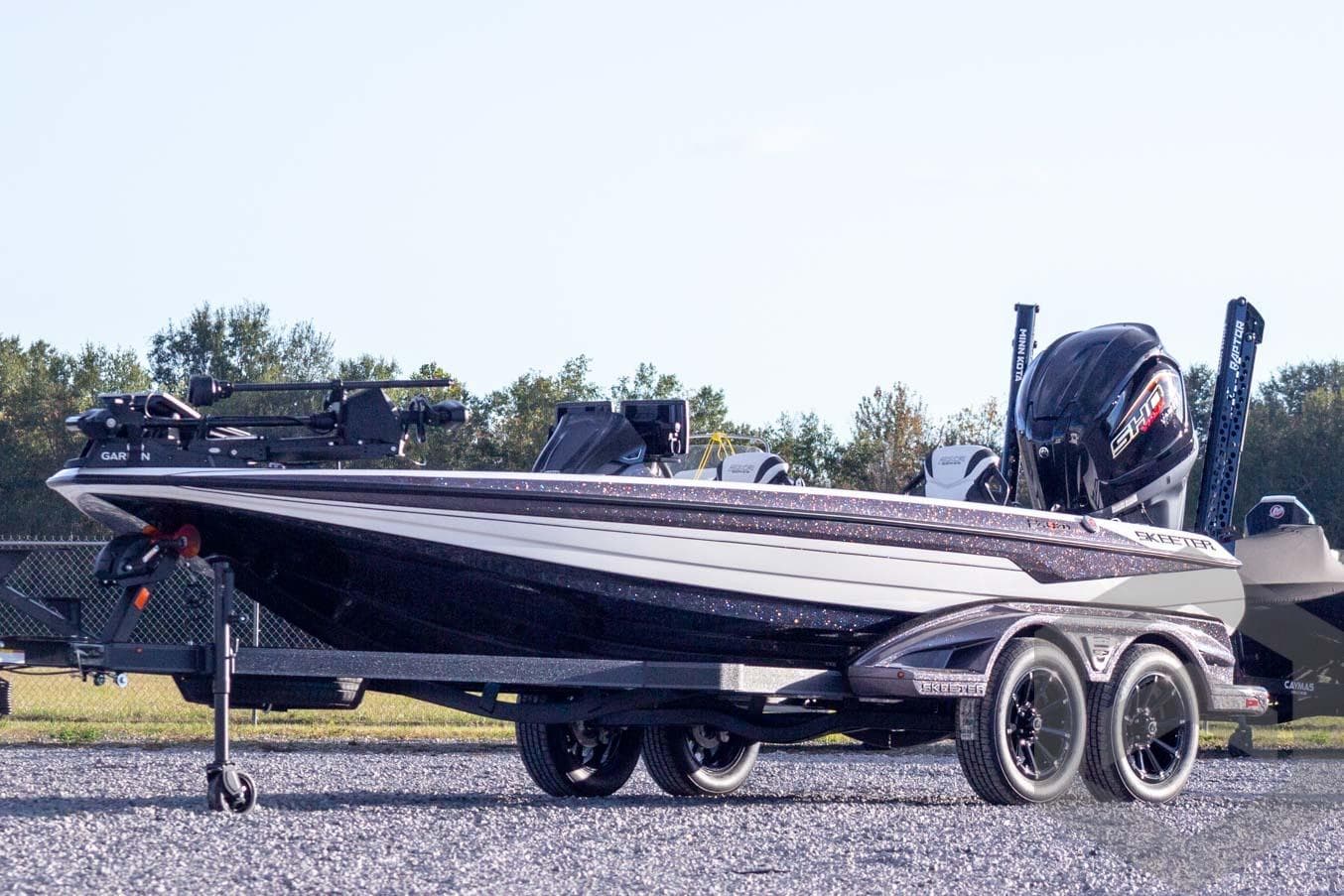 2026 Skeeter FXR21 FLEX boat on trailer, featuring sleek design and powerful engine.