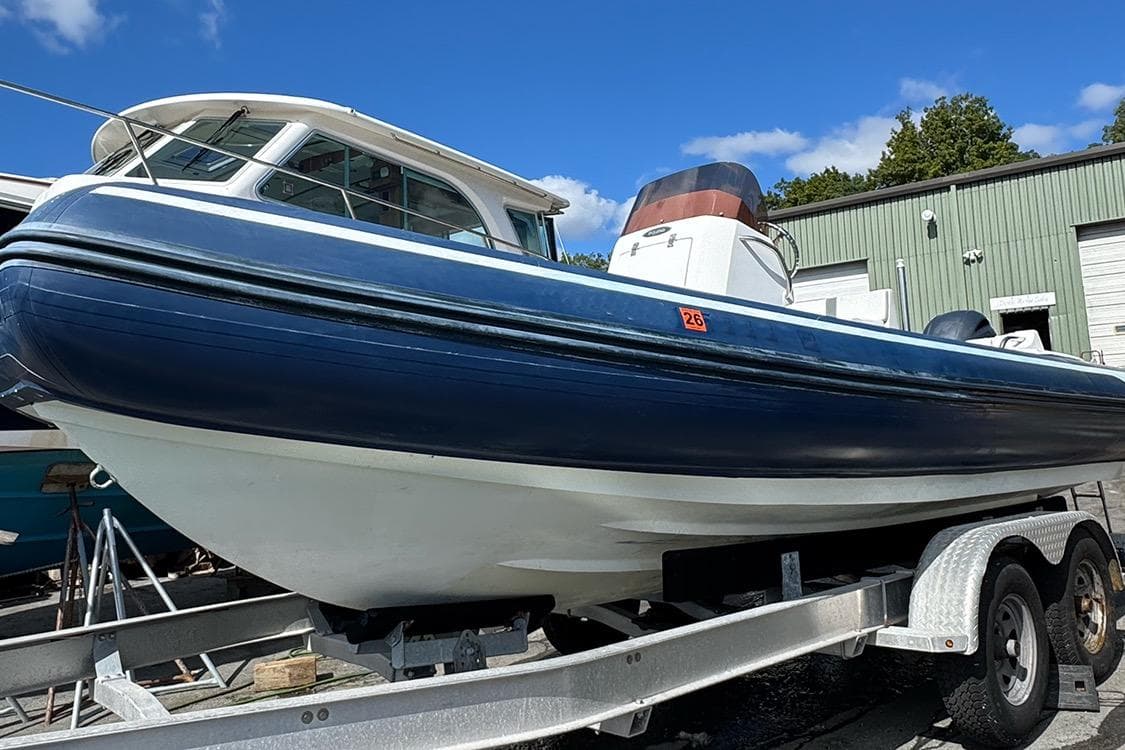2020 AB Inflatables Oceanus 21 VST boat on trailer, parked outdoors.