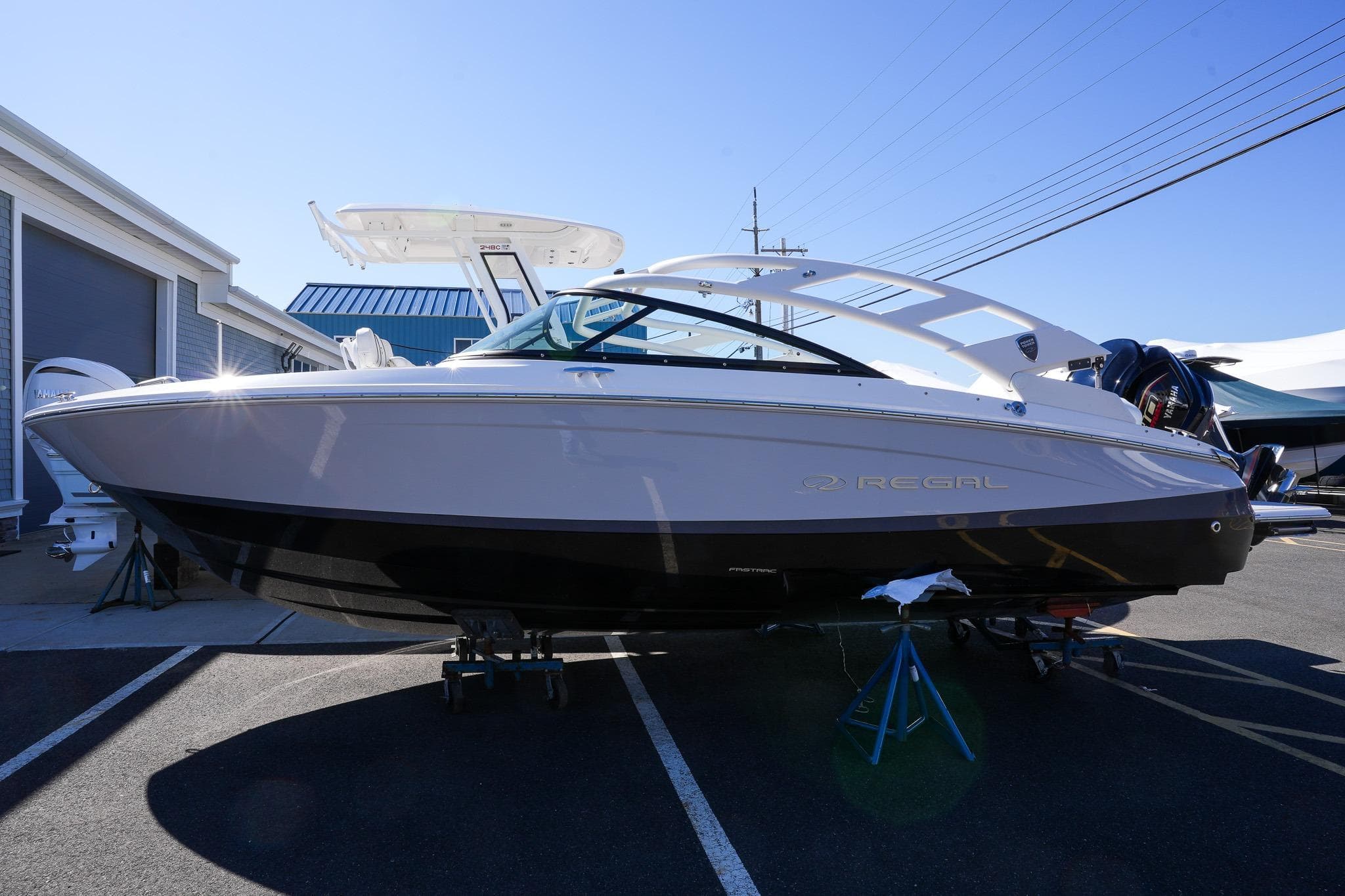 2026 Regal LX2 boat displayed outdoors on a sunny day.